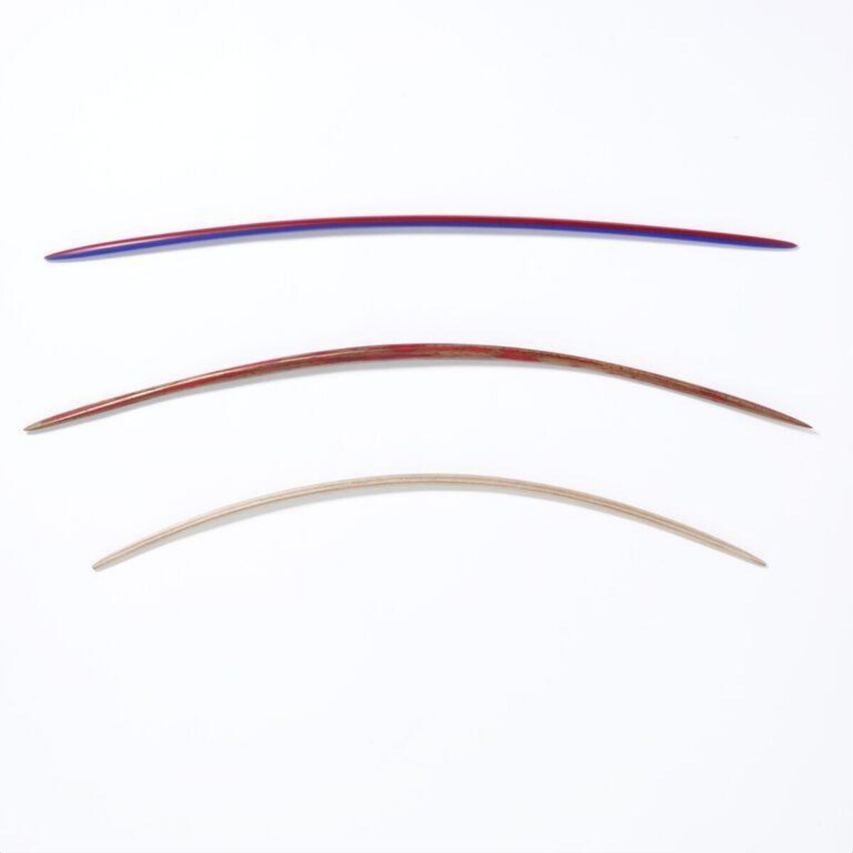 Three Curved Knitting Needles