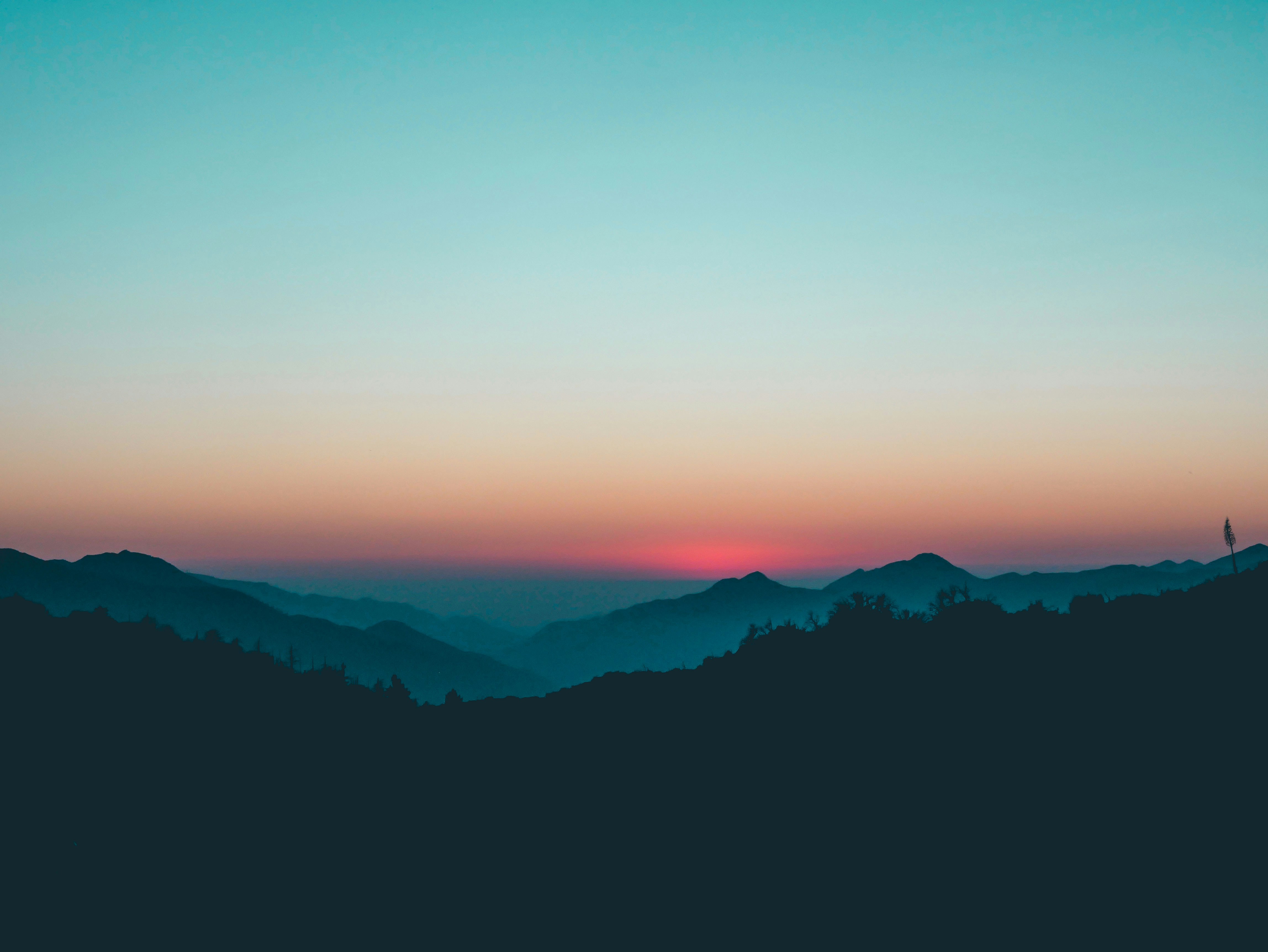 Layered Mountains at Sunset