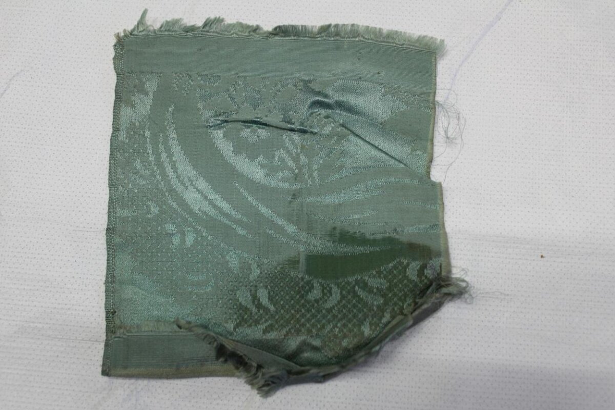 Frayed Green Patterned Fabric Scrap