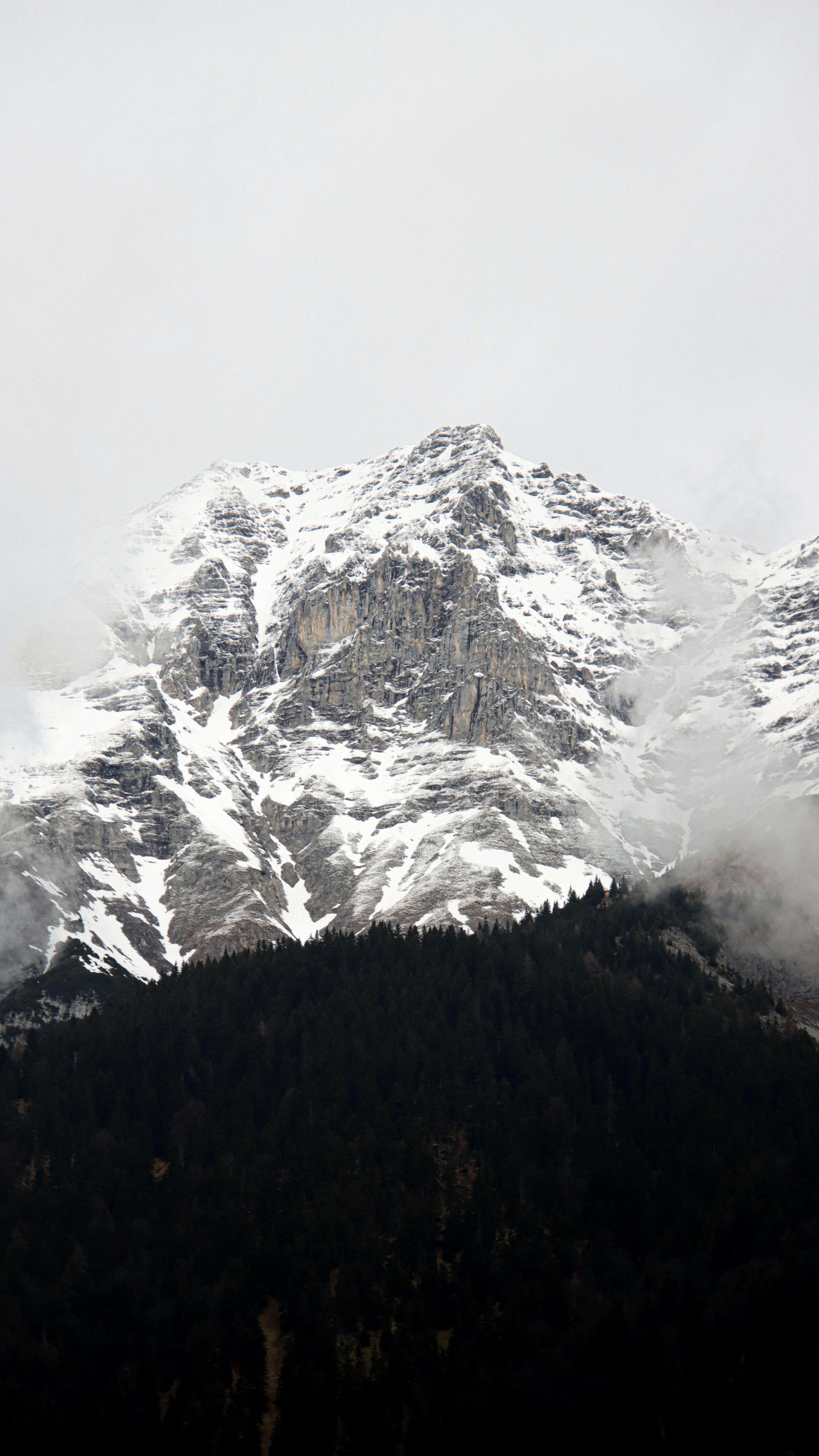 Misty Snow-Capped Mountain