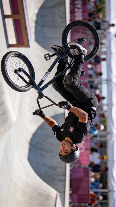BMX Athlete Performs Mid-air Trick