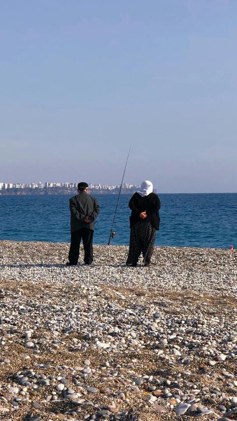 Elderly Couple on Pebble Beach