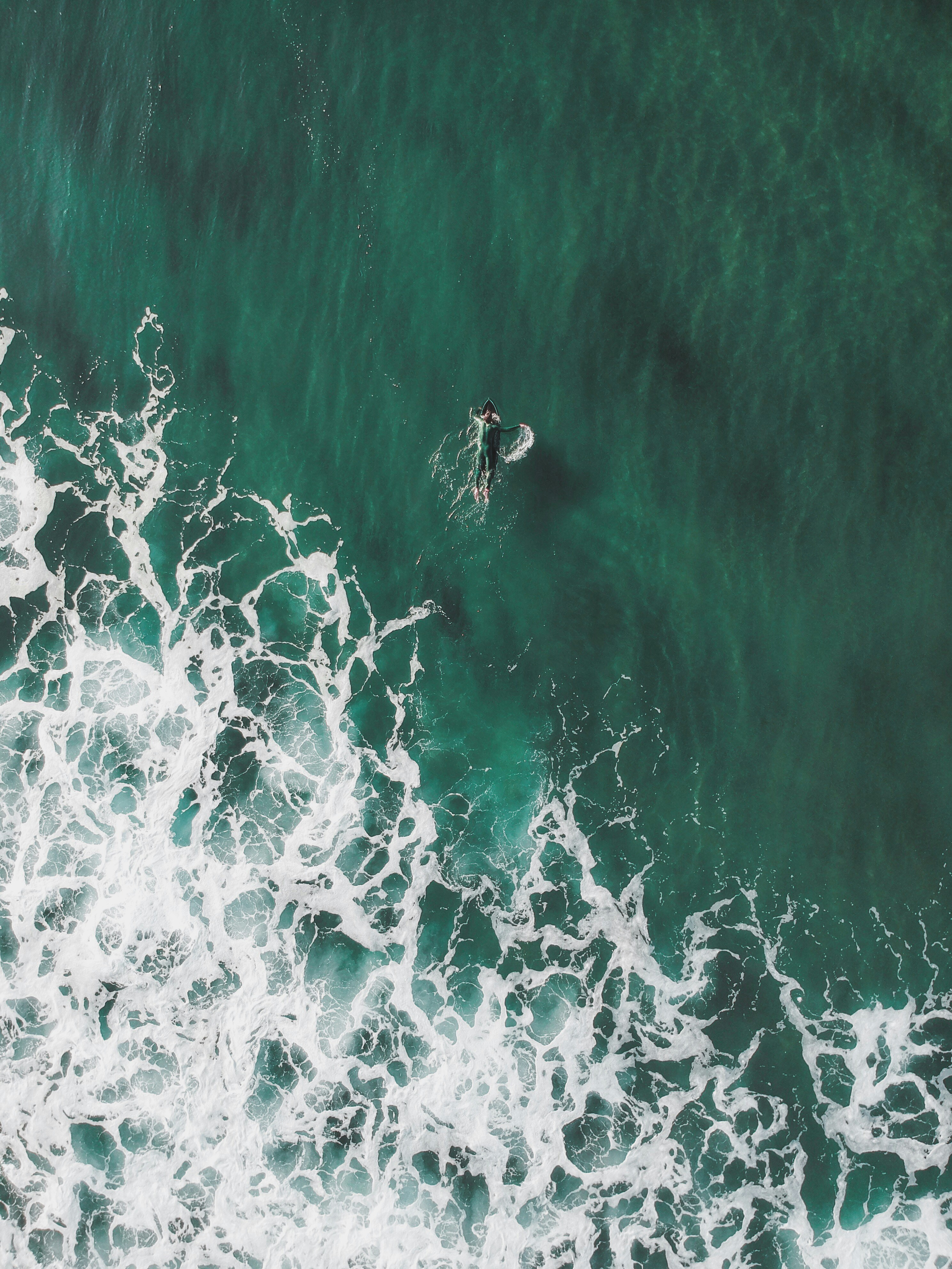 Aerial View of Surfer in Ocean — Scenery Wallpapers