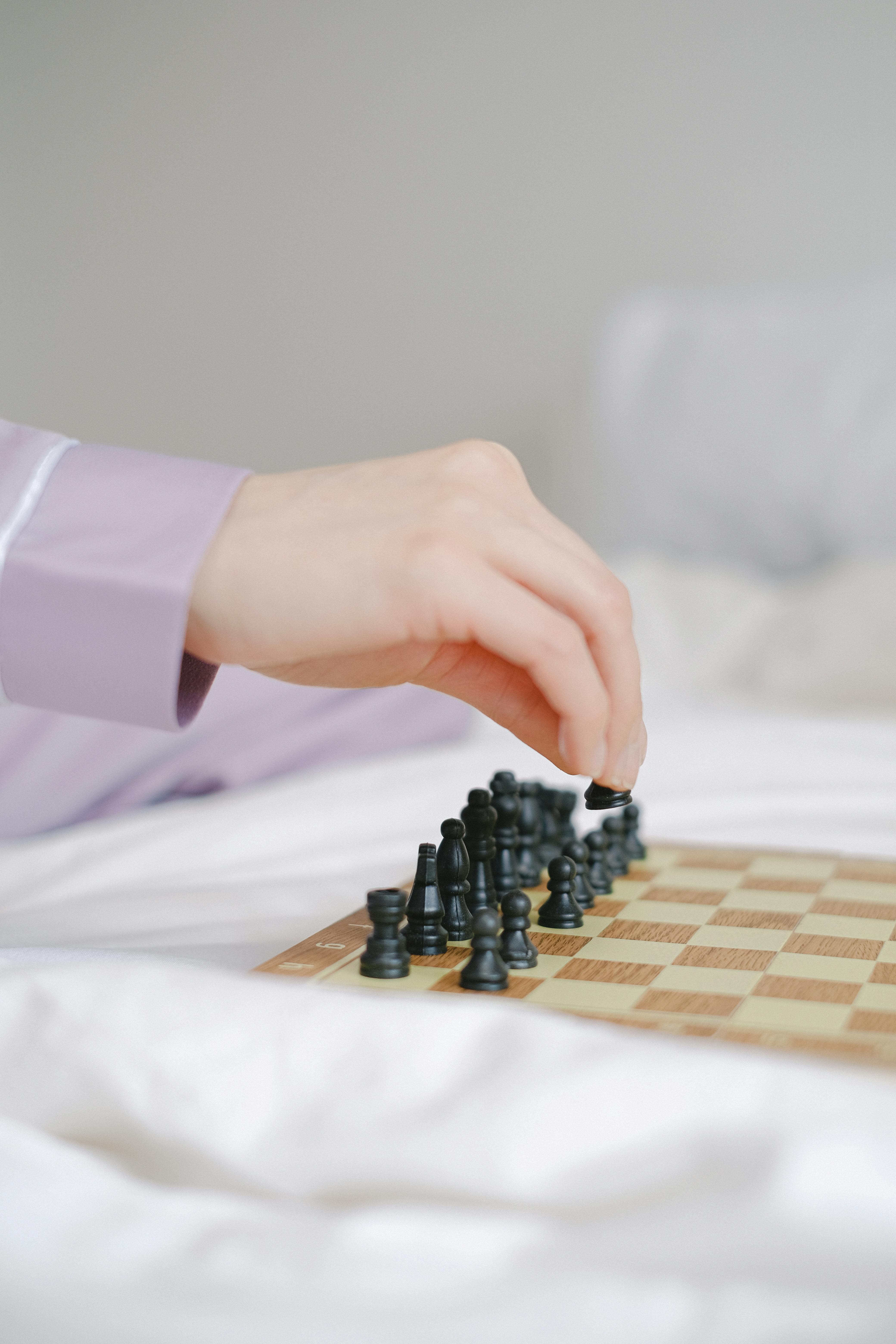 Hand Moving Black Chess Piece — Games