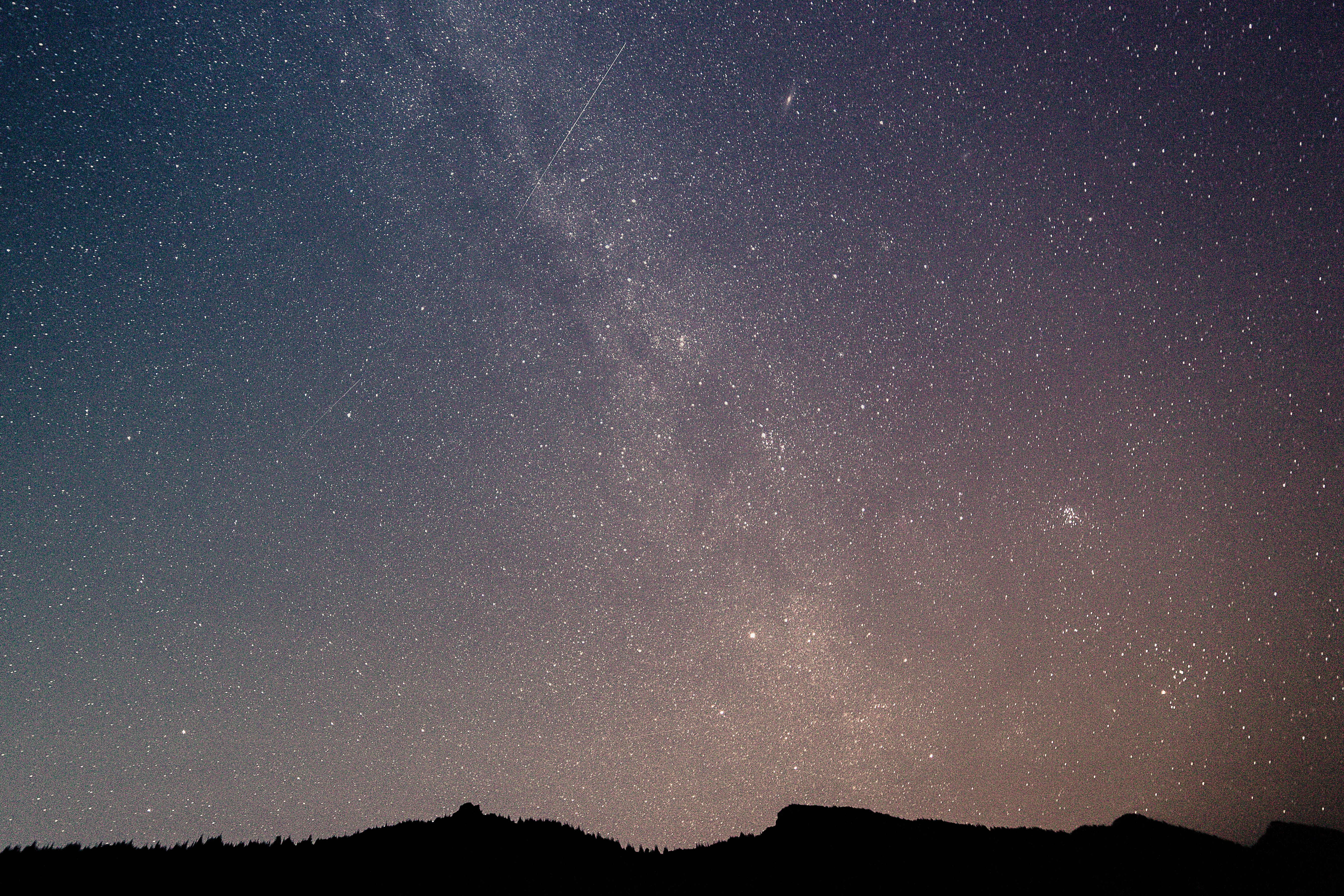 Starry Night with Meteors over Mountains