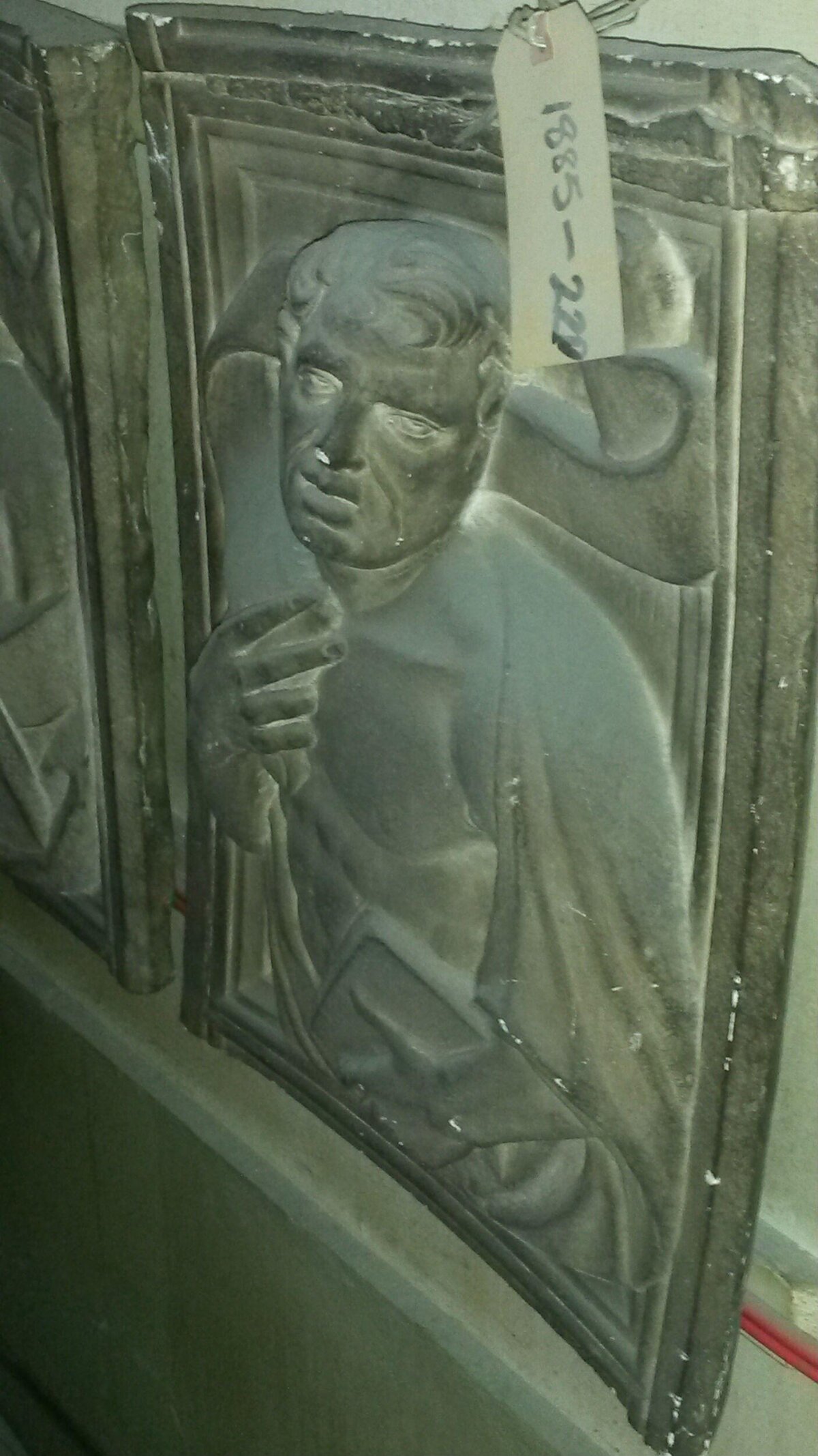 Relief sculpture of a man