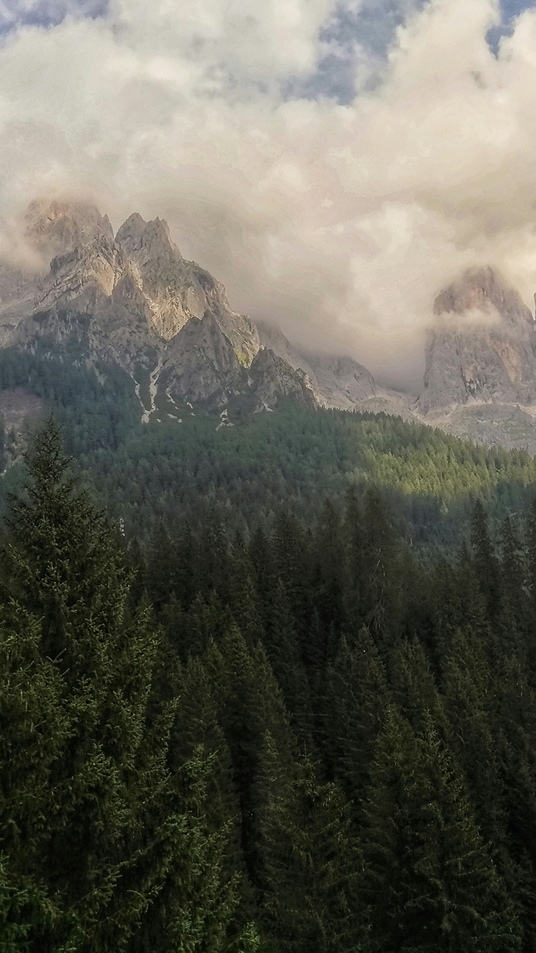 Cloud-Covered Rocky Mountain Landscape