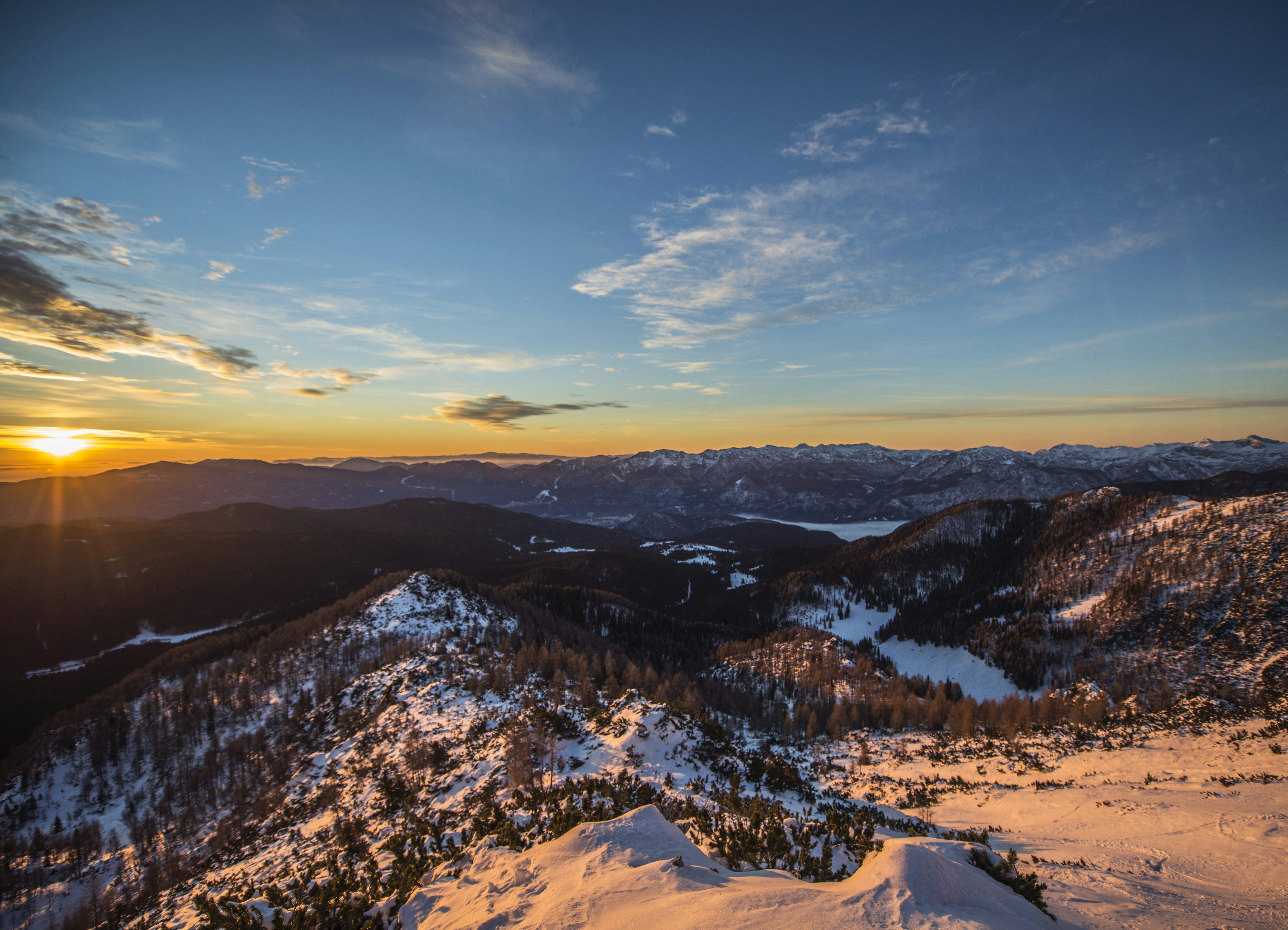 Sunset Over Snowy Mountain Range