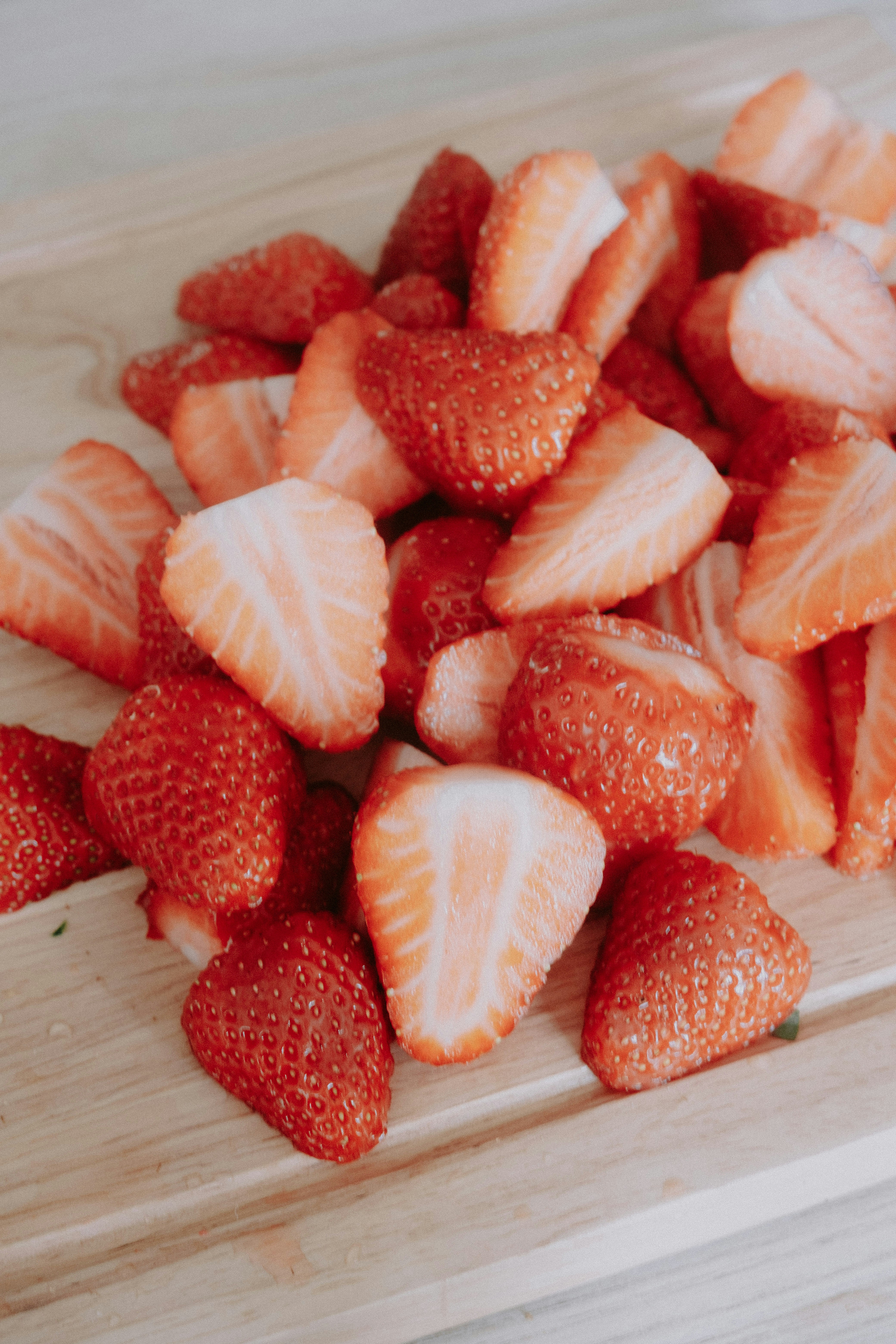 Sliced Strawberries on Cutting Board