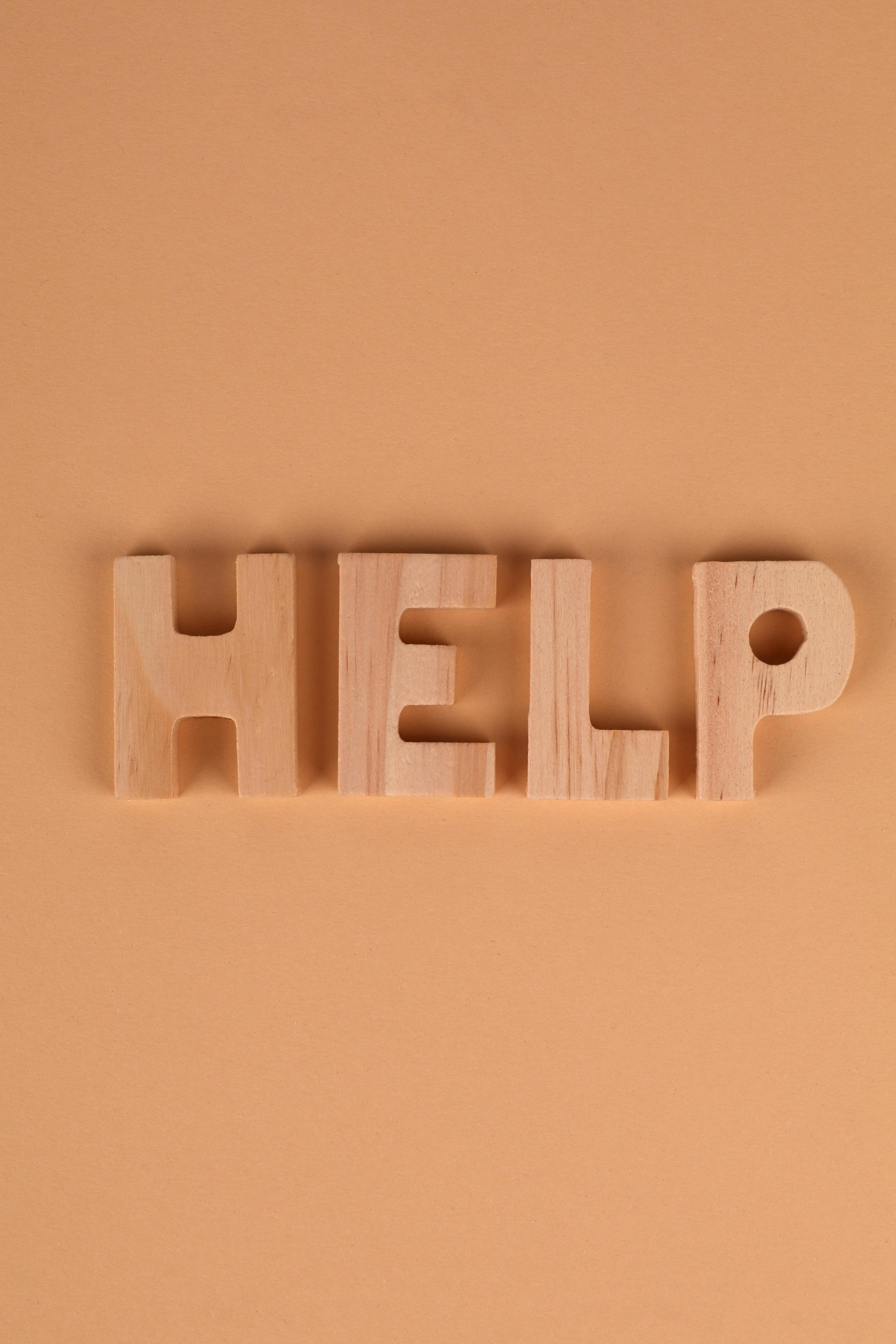 Wooden Letters Spelling HELP
