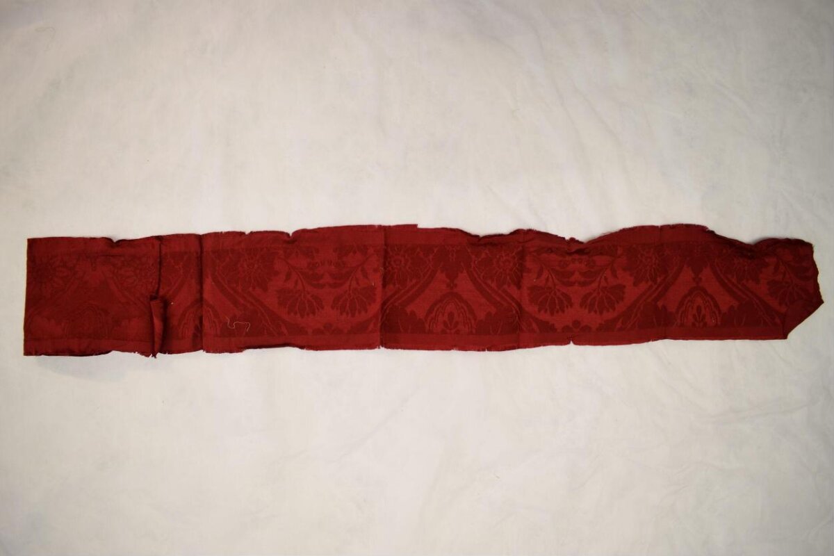 Red Patterned Fabric Fragment