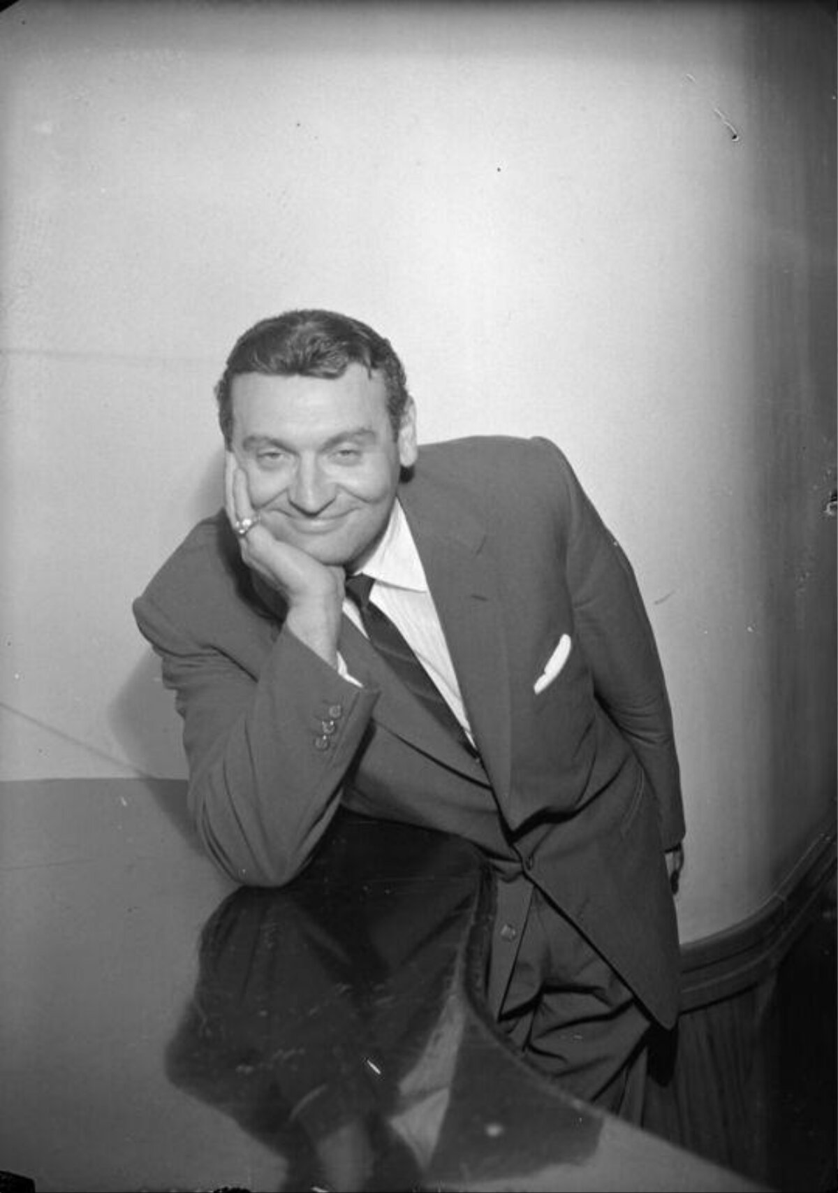 Vintage Portrait of Smiling Man in Suit