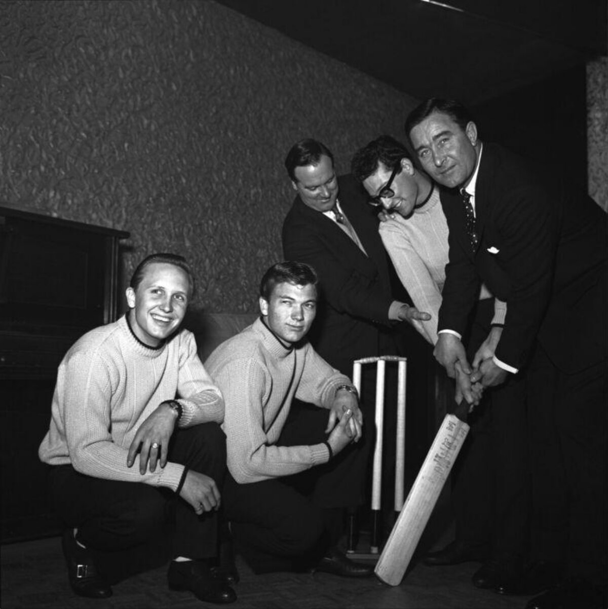 Five Men With Cricket Equipment