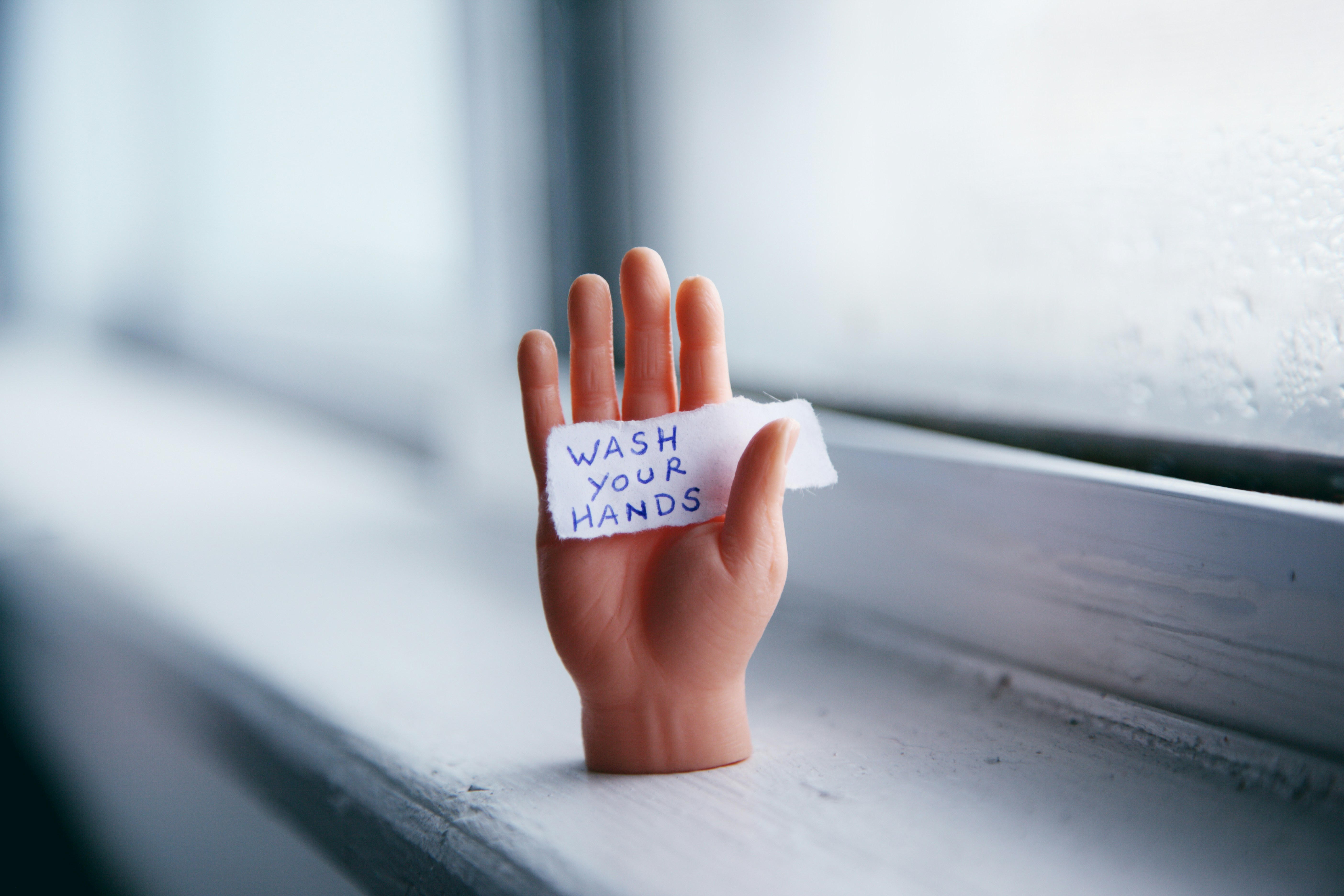 Miniature Hand With Wash Your Hands Reminder