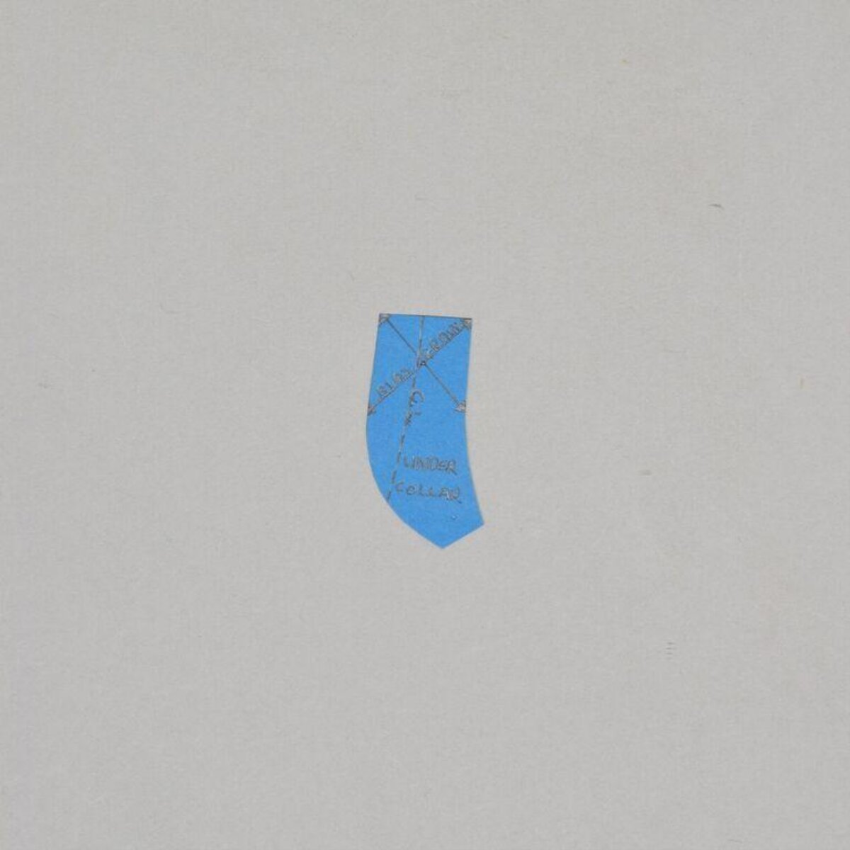Blue Sewing Pattern Piece on Gray Background
