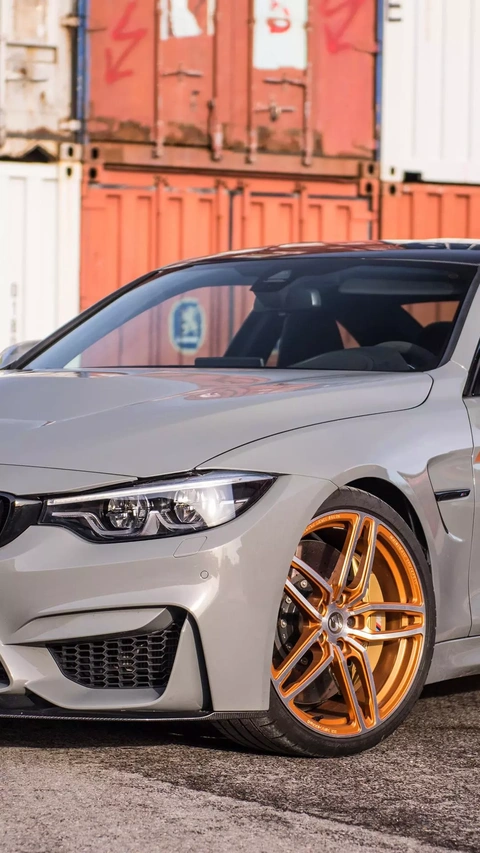Silver BMW with Custom Orange Wheels