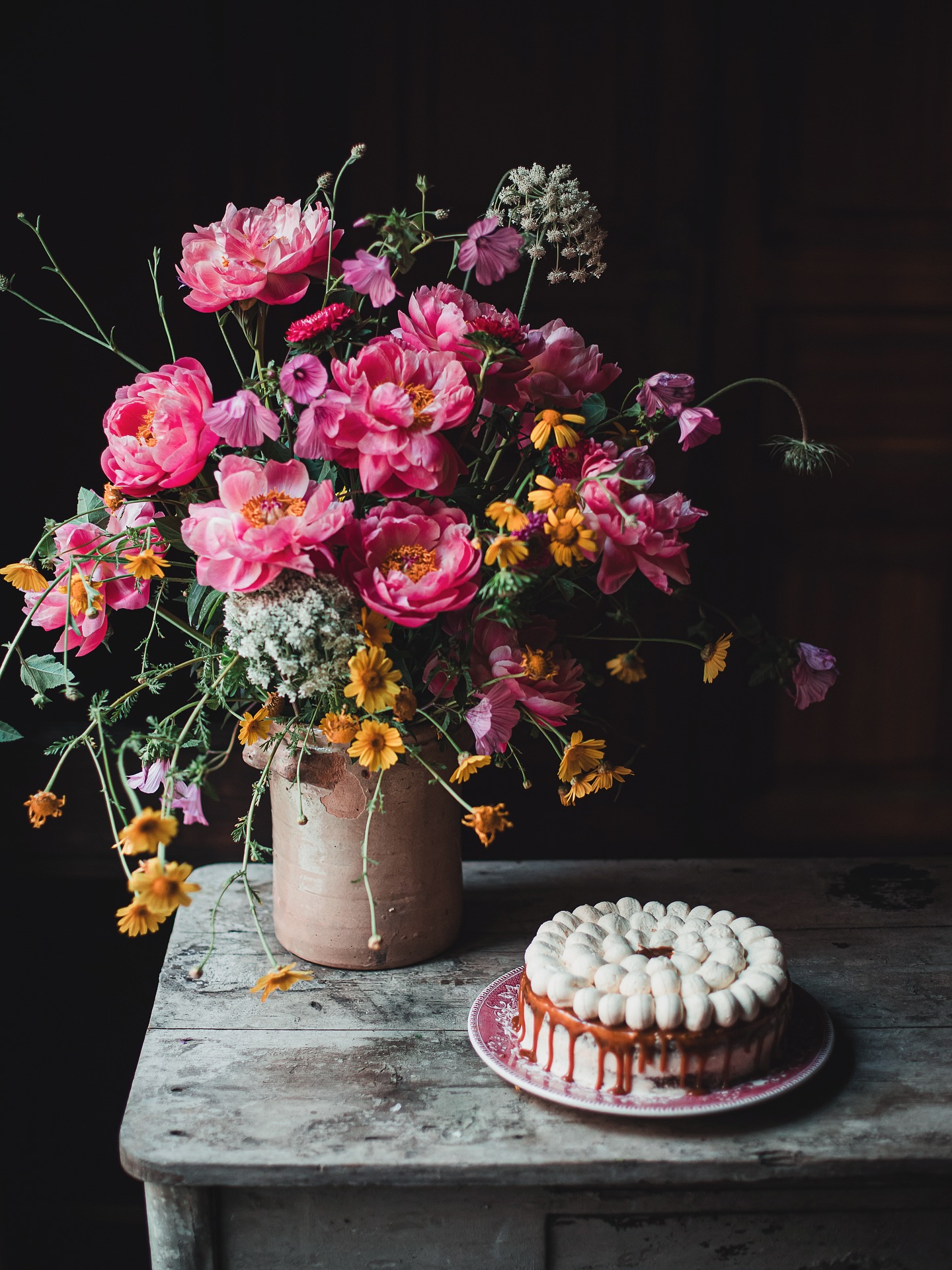 Still Life of Flowers and Caramel Cake