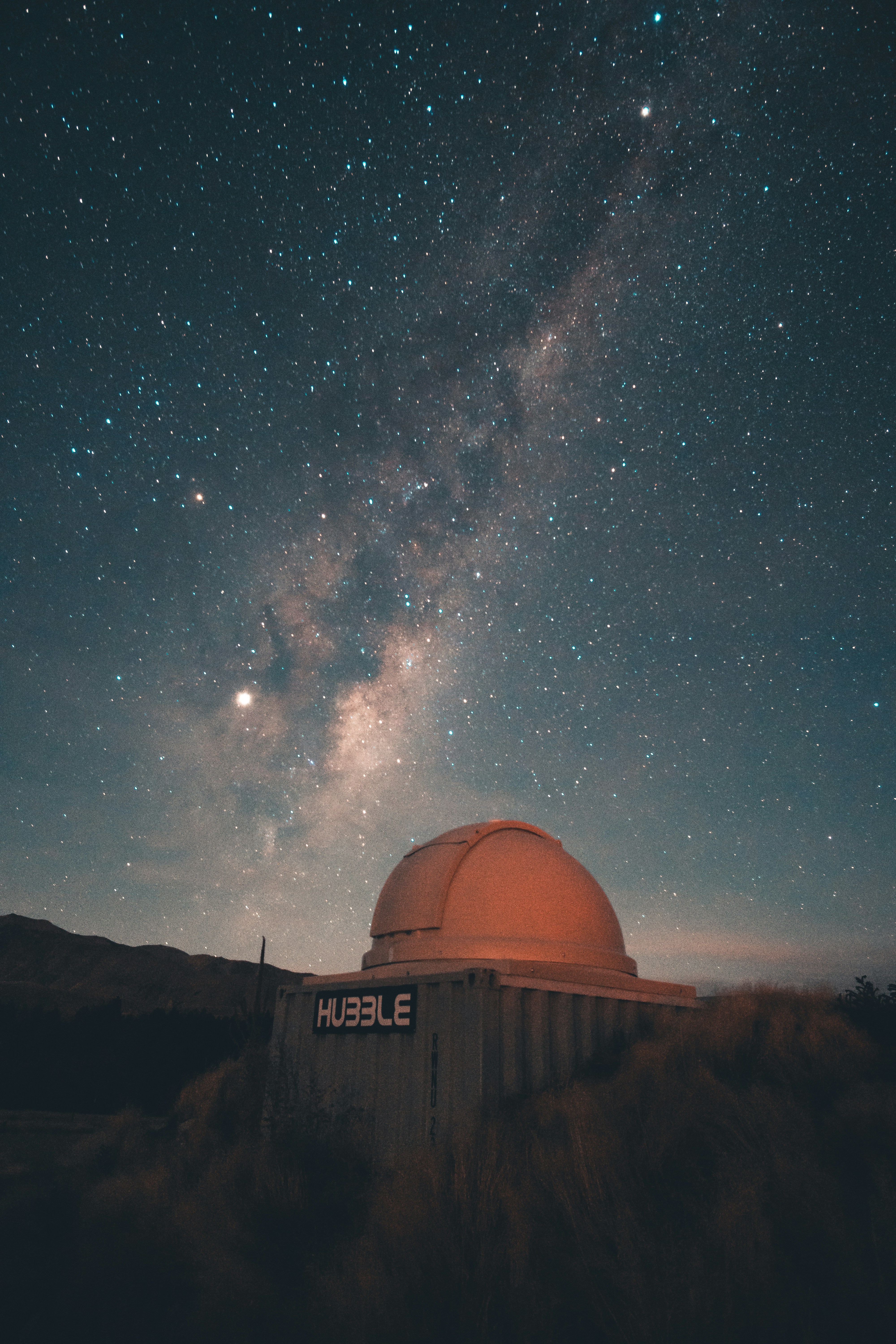 Hubble Observatory Under Starry Night Sky