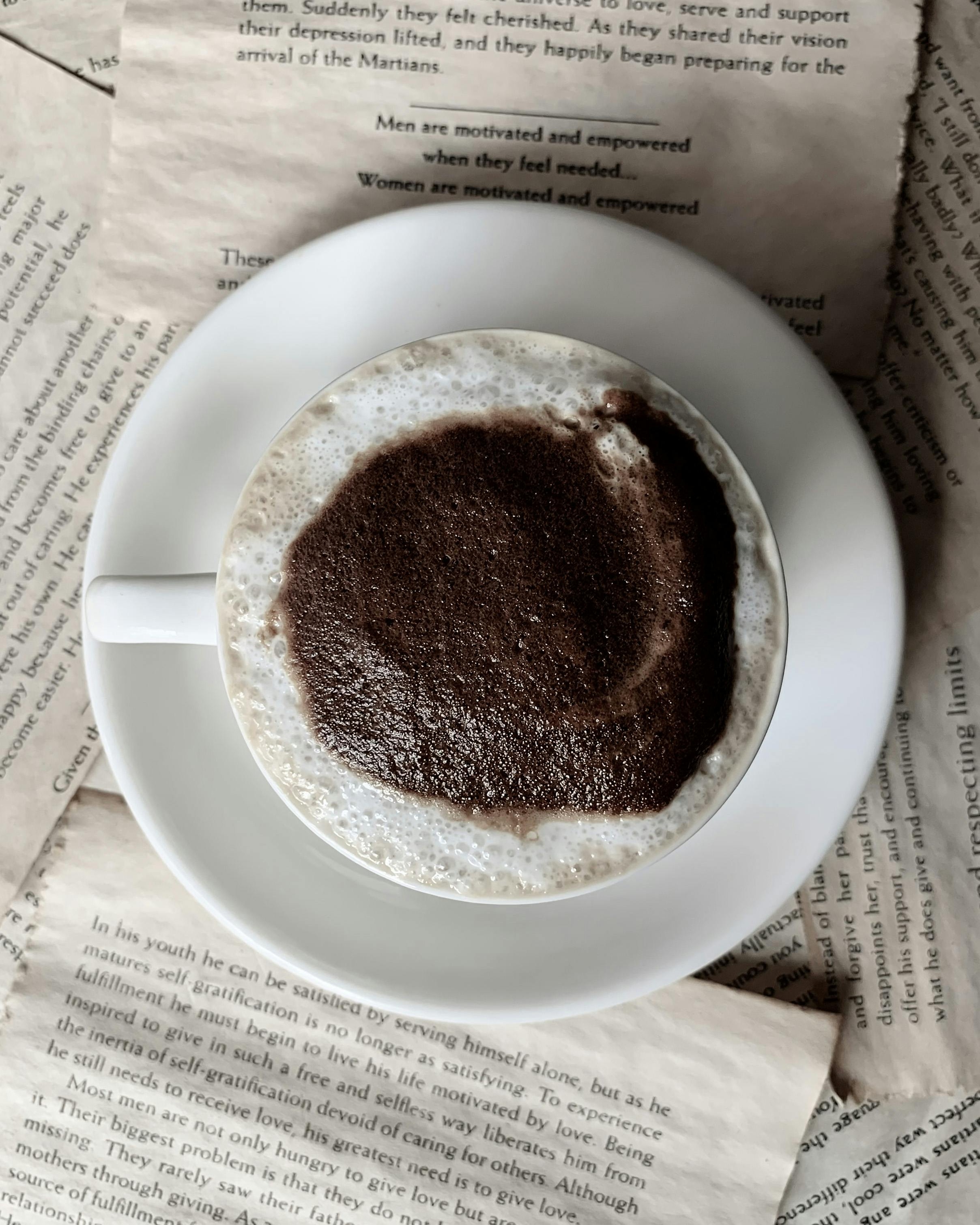 Coffee on Open Book Pages