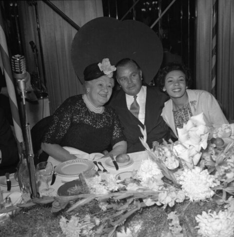Three People at Formal Dinner Event