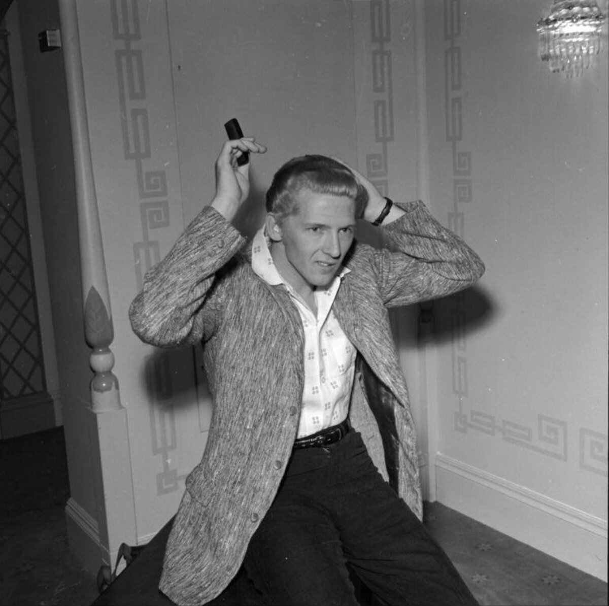 Man Combing His Hair