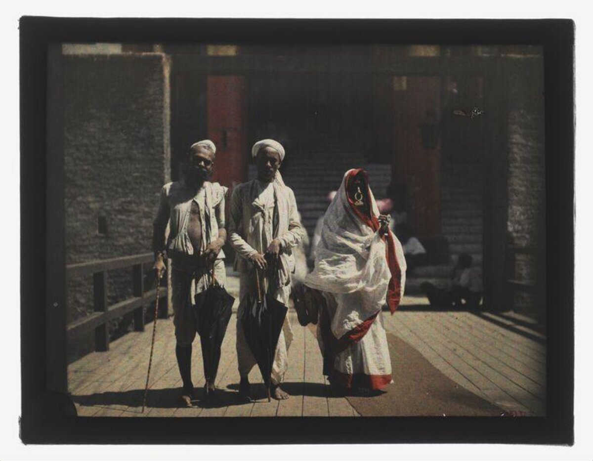 Three People in Traditional South Asian Attire