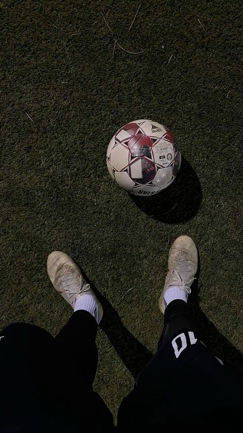 Soccer Ball on Football Turf