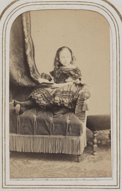 Vintage Portrait of Seated Young Girl