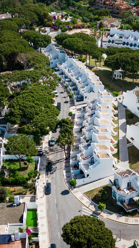 Aerial View of White Coastal Townhouses