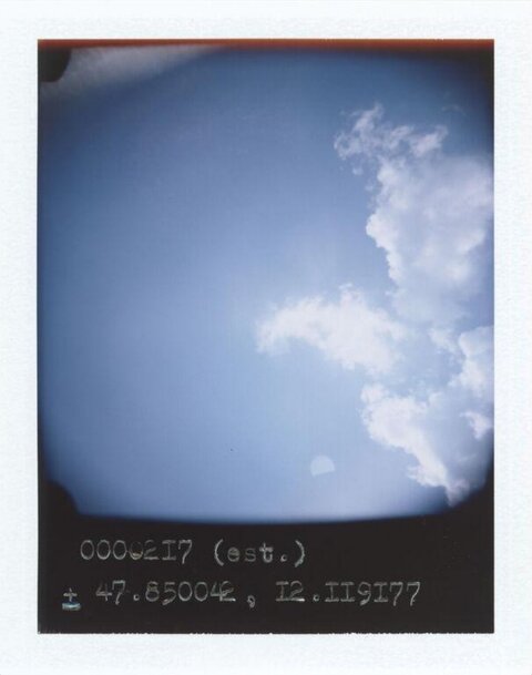 Polaroid Shot of Blue Sky With Clouds