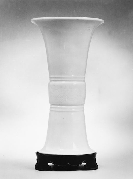 White Porcelain Vase with Wooden Base