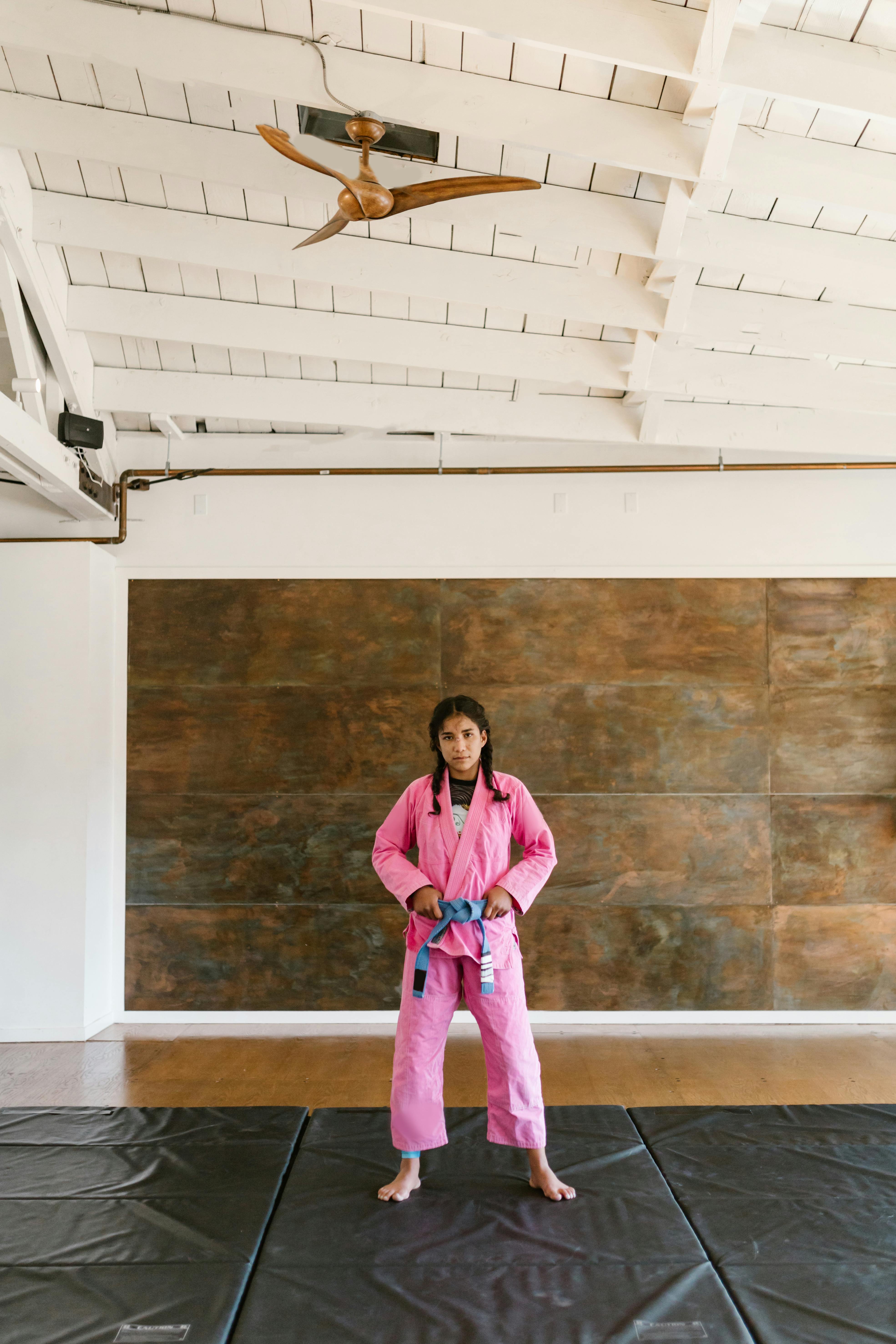 Young Martial Artist in Pink Gi