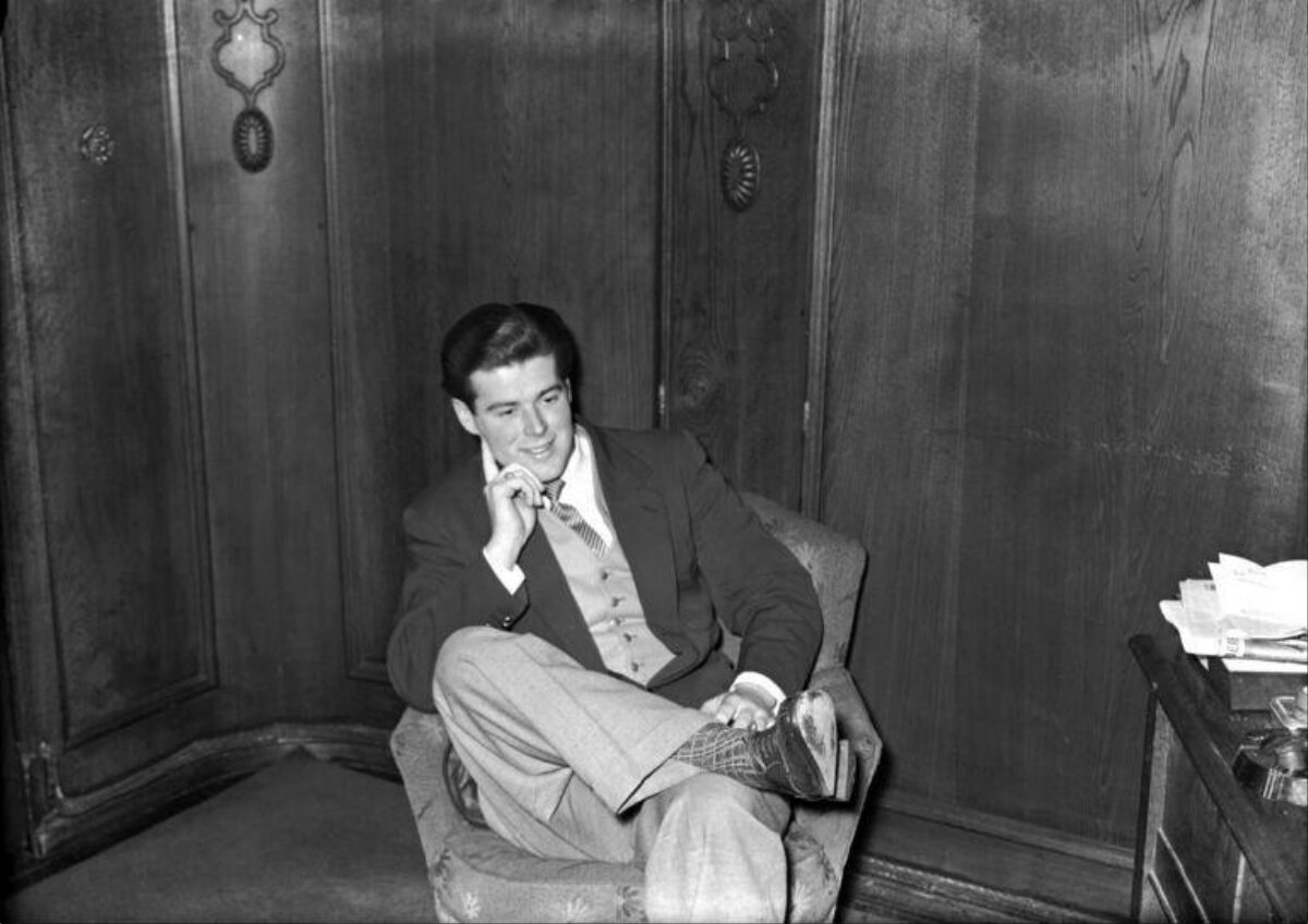 Well-dressed Man Relaxing in Chair