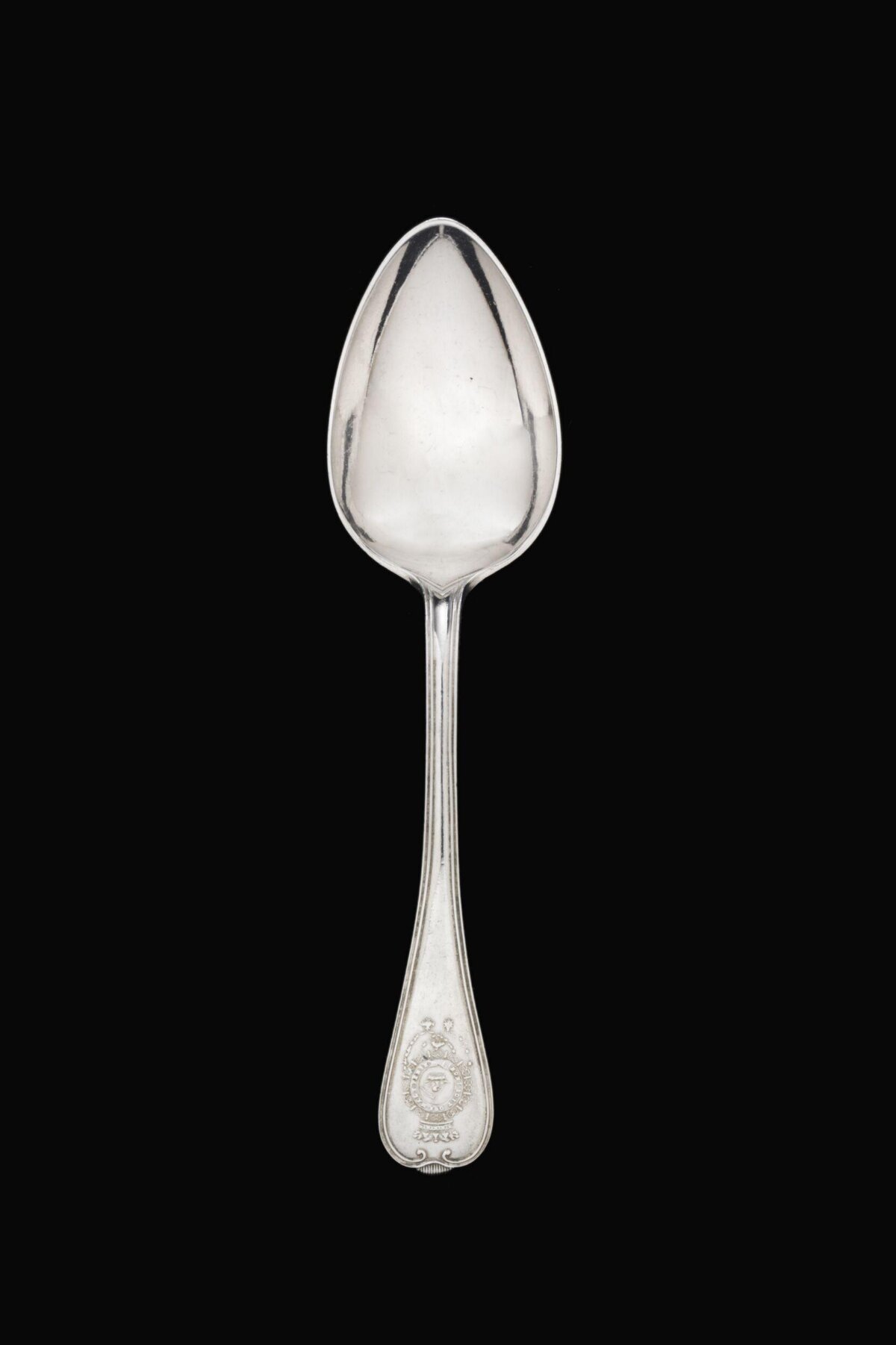 Silver Spoon on Black Background