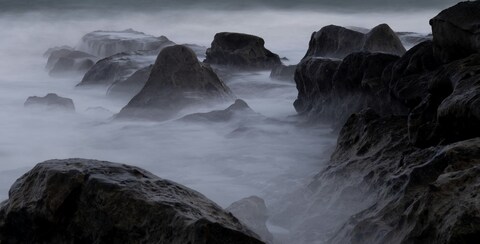 Misty Coastal Rock Seascape