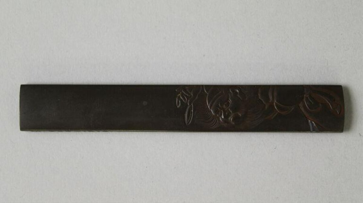 Carved Dark Metal Sword Fitting