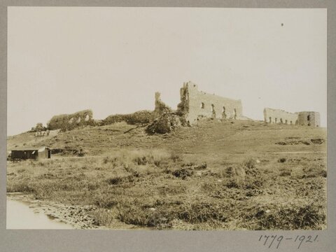 Ancient Ruins on Grassy Hillside