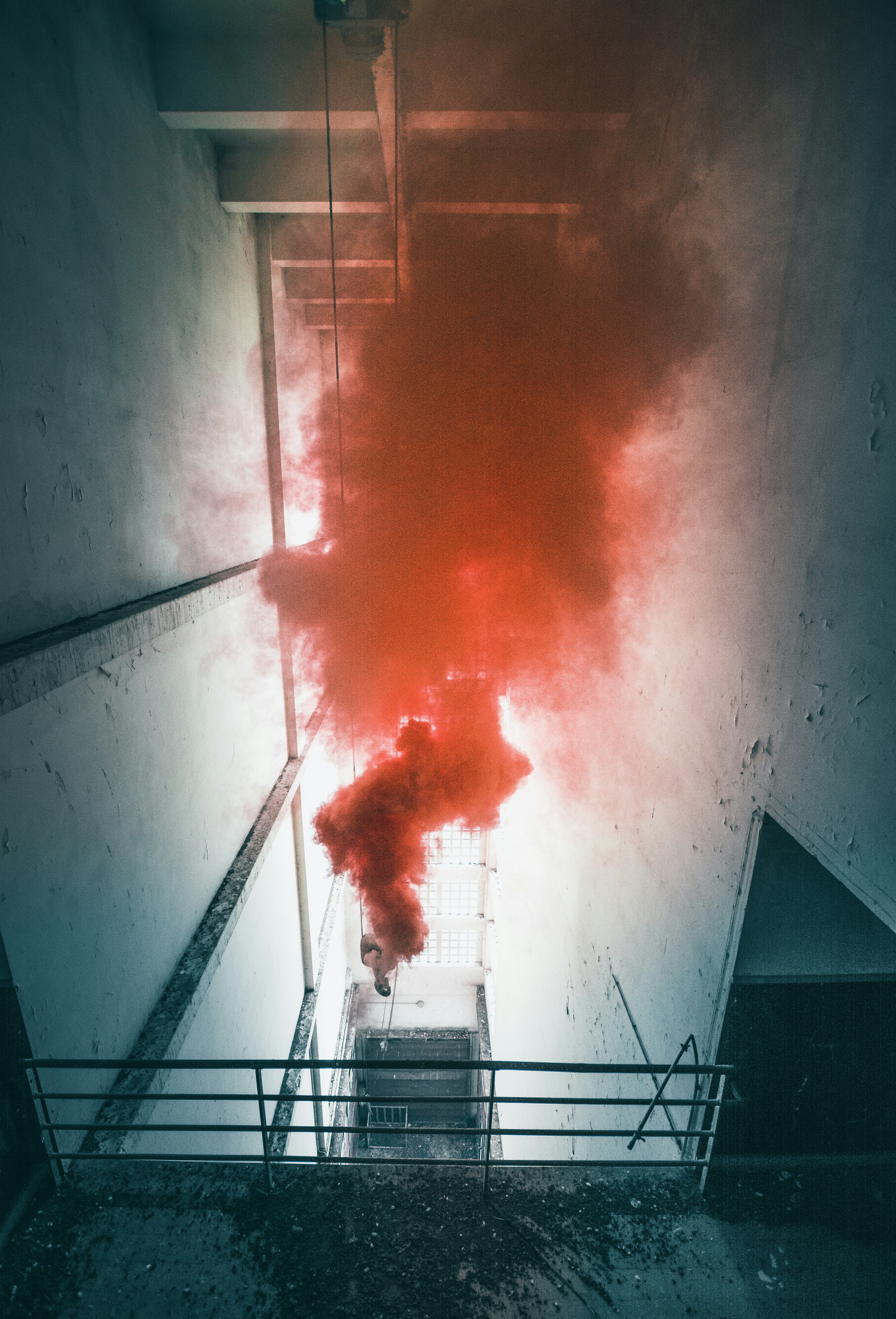 Red Smoke in Empty Stairwell