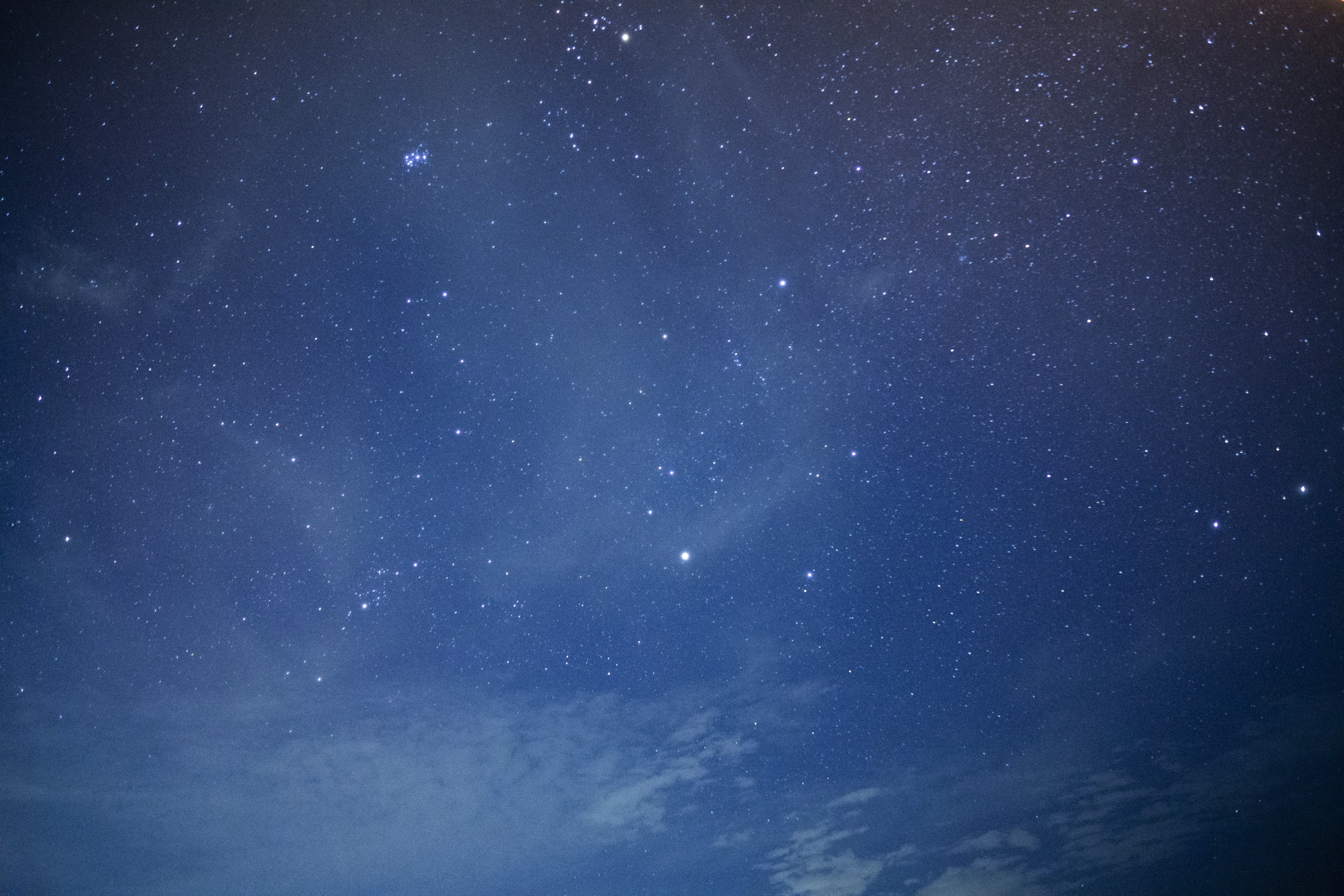 Starry Night Sky with Clouds