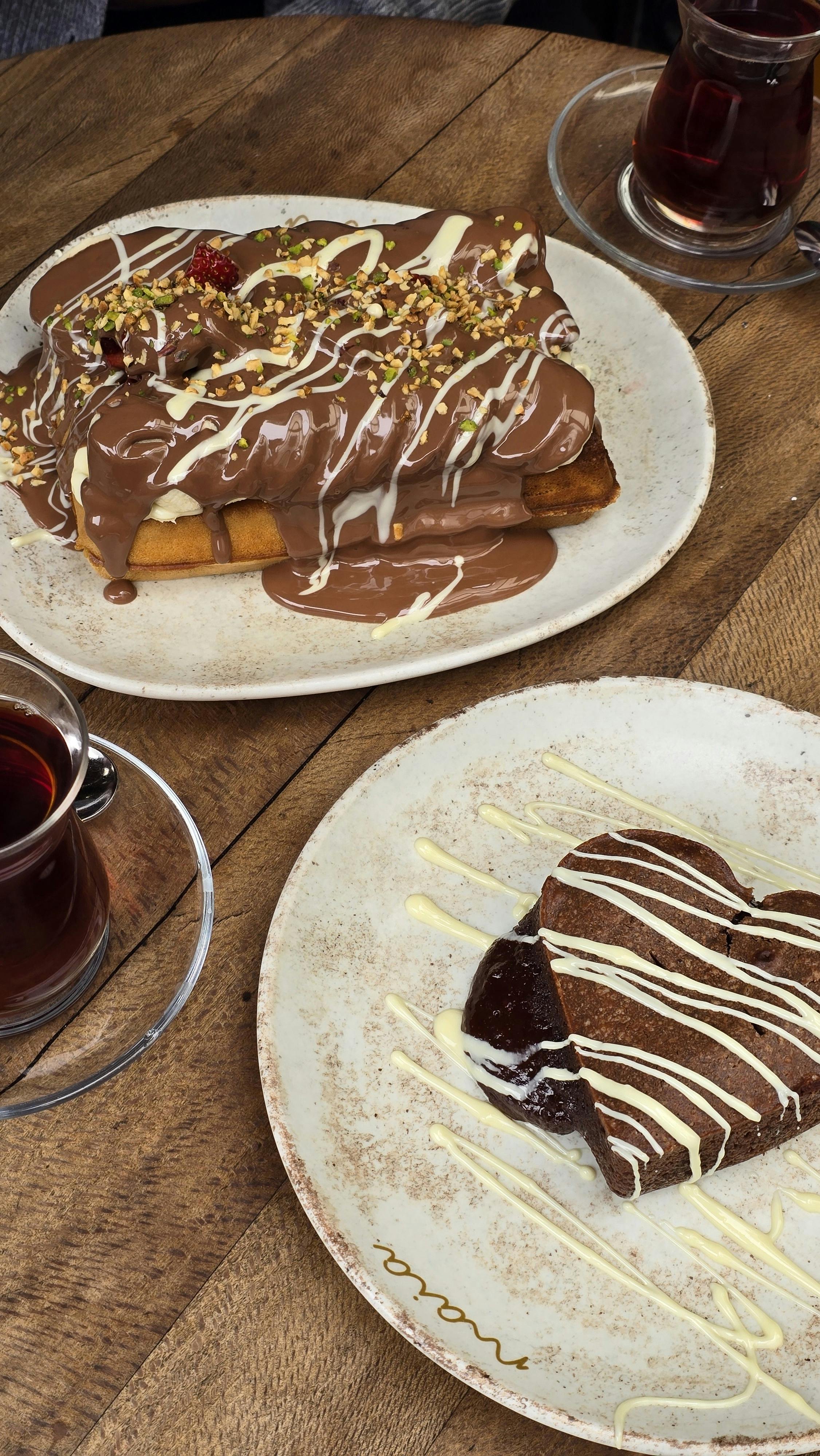 Chocolate Desserts and Turkish Tea on Wooden Table