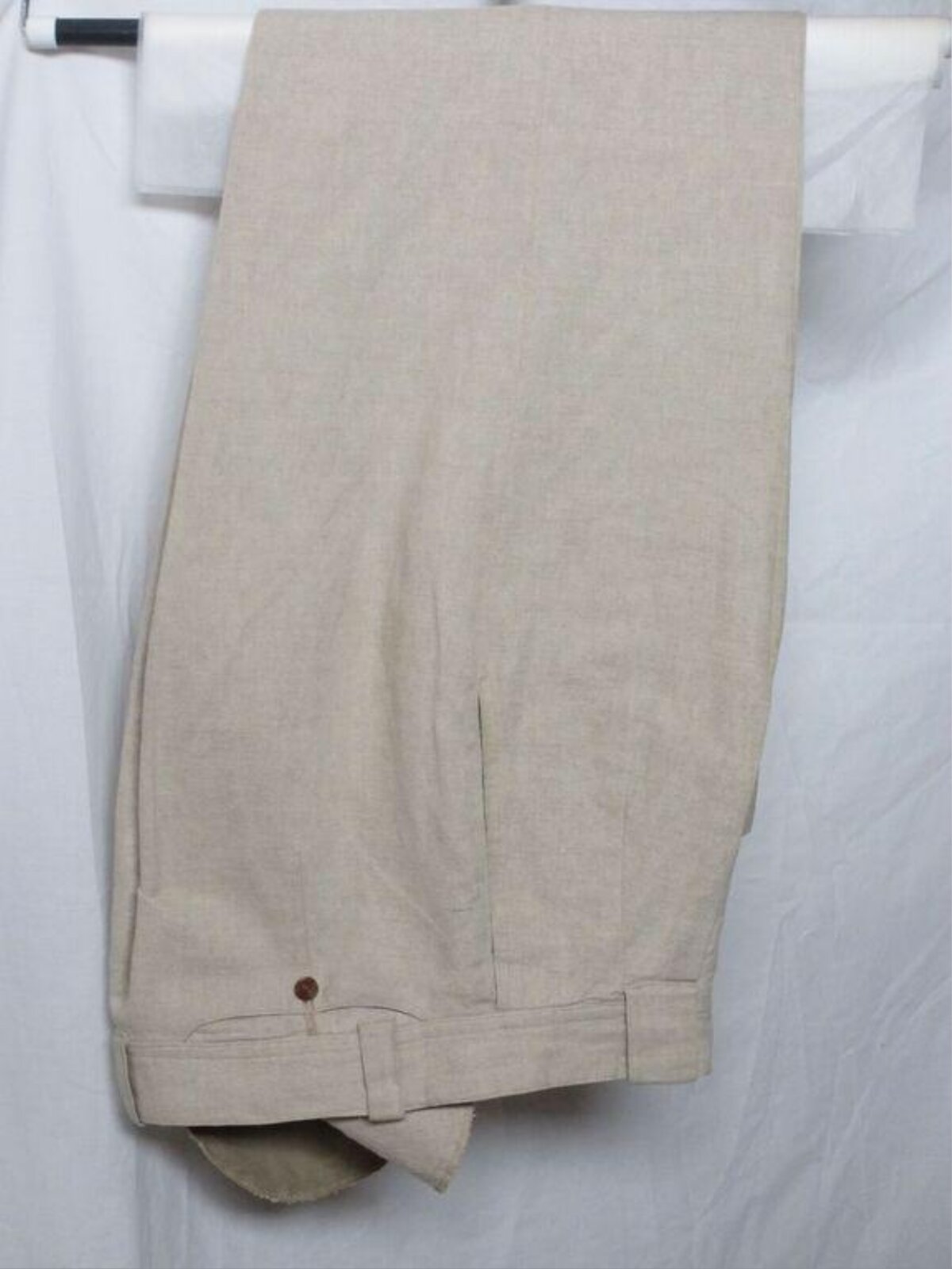 Folded Beige Linen Trousers