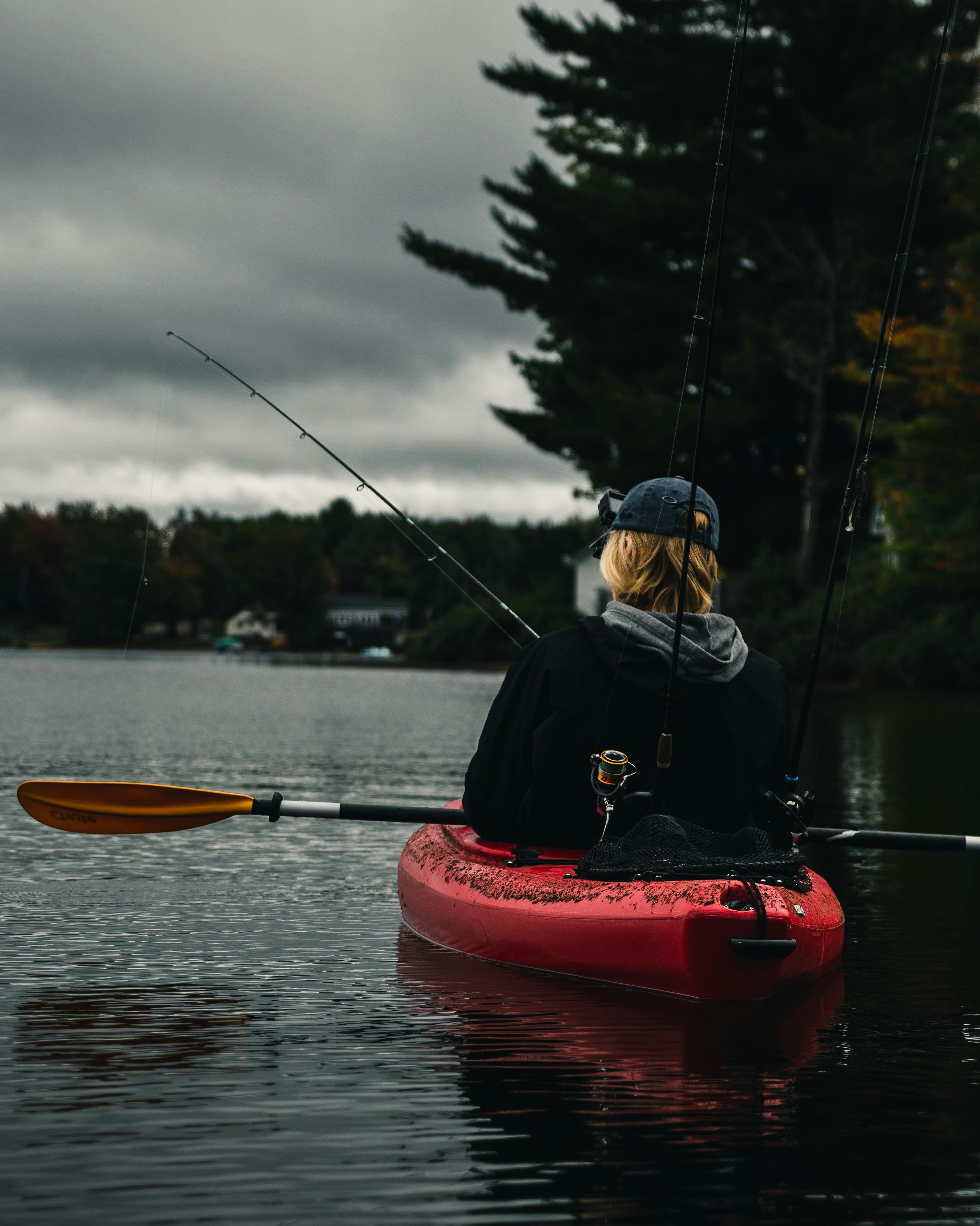 Kayak Fisherman on Calm Lake