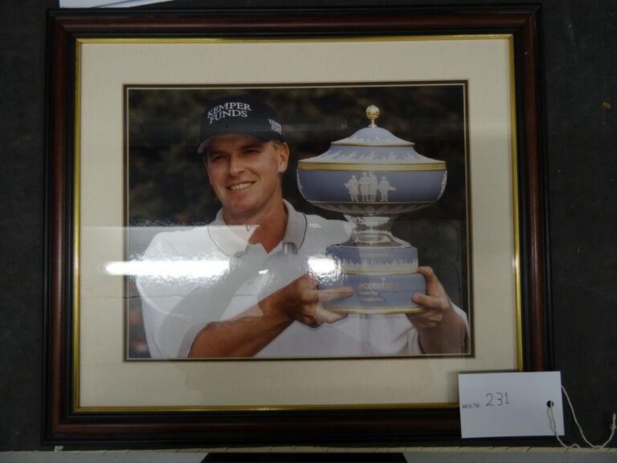 Framed Photo of Golfer With Trophy