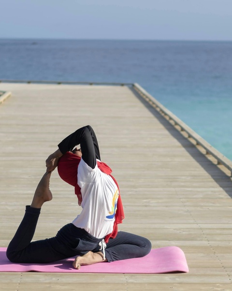 Yoga Practice on Ocean Pier
