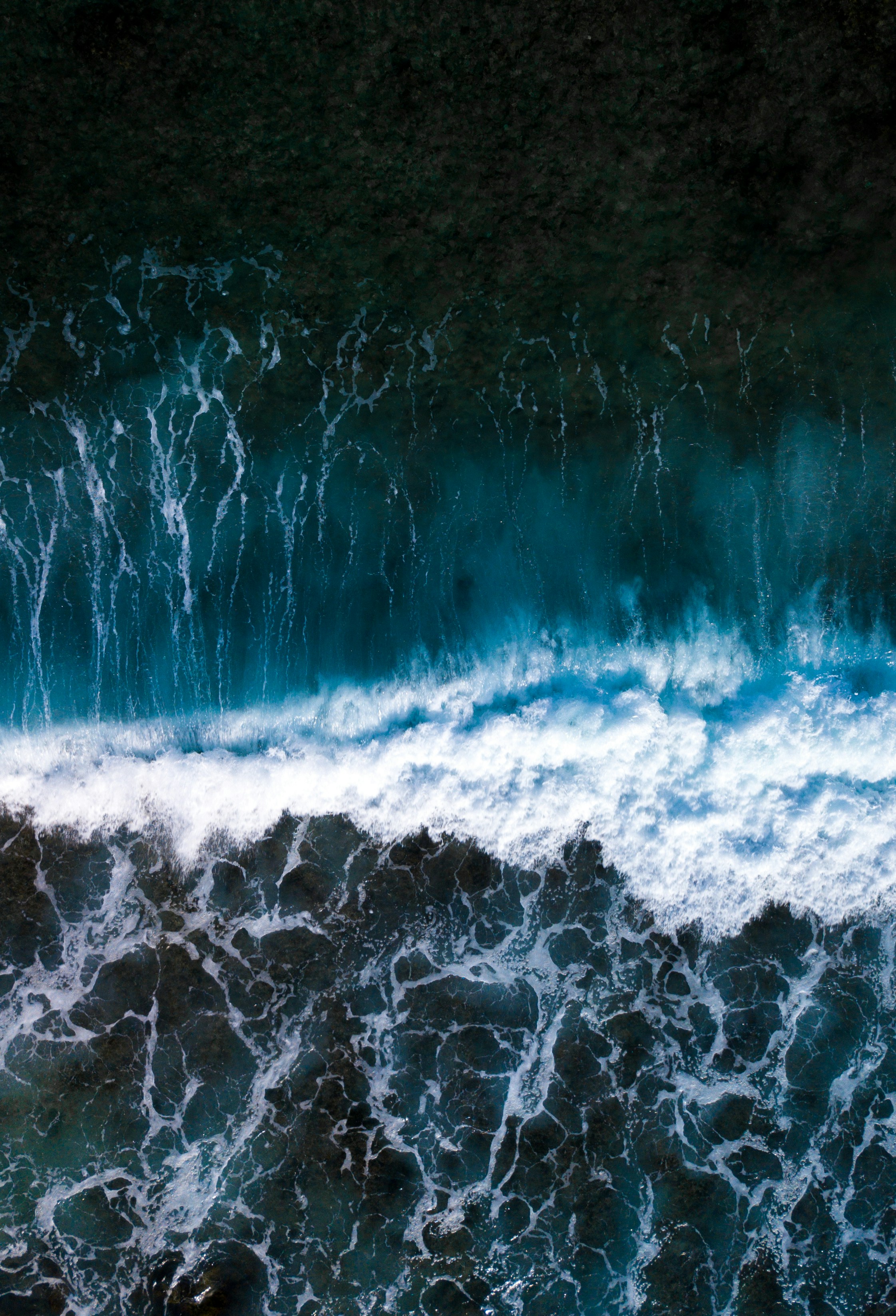Aerial View of Breaking Ocean Wave