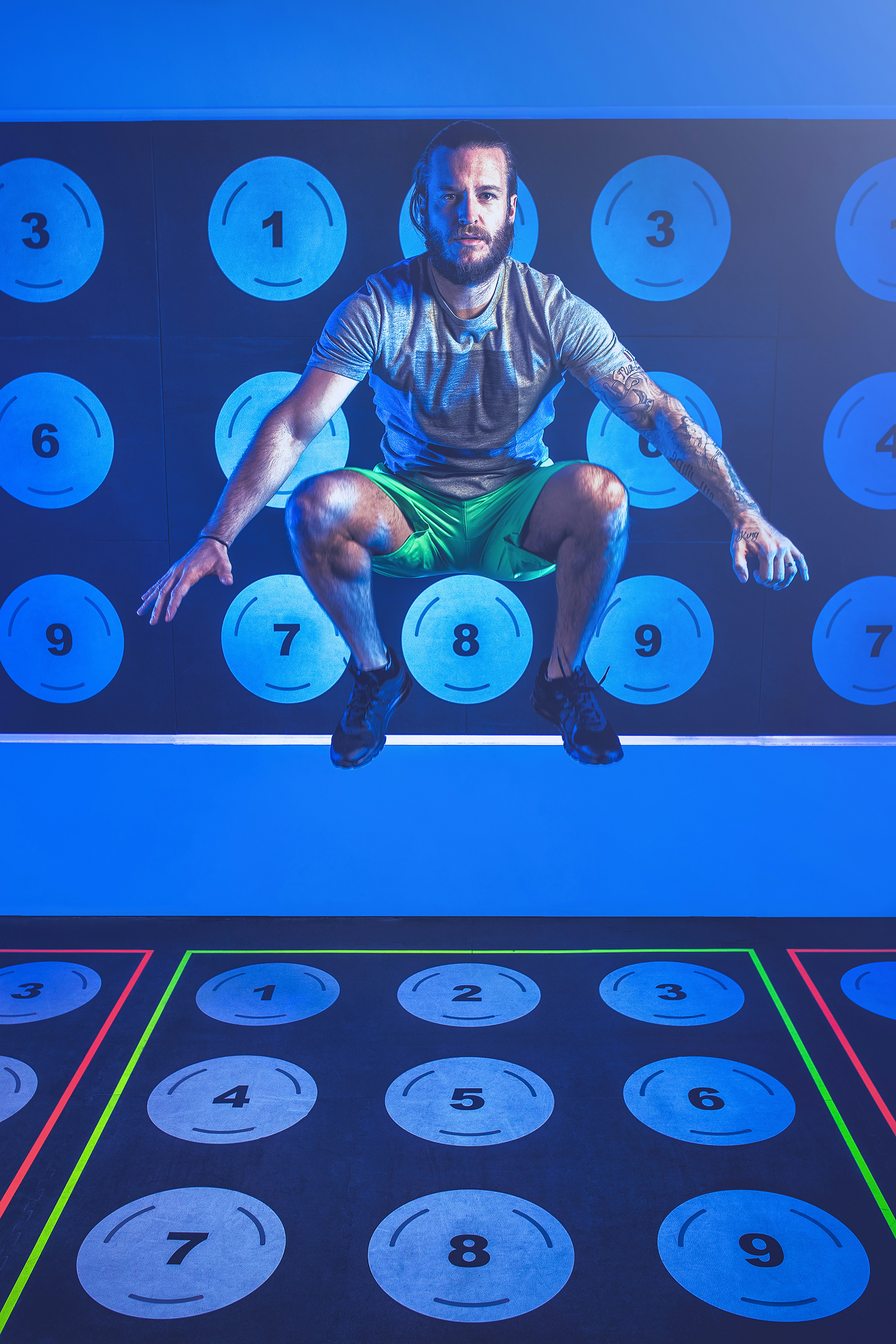Man Jumping In Interactive Fitness Training