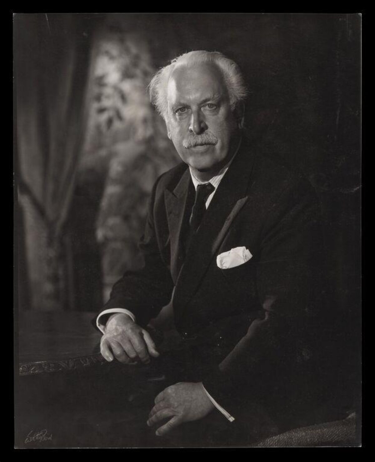 Formal Portrait of Elderly White-haired Gentleman