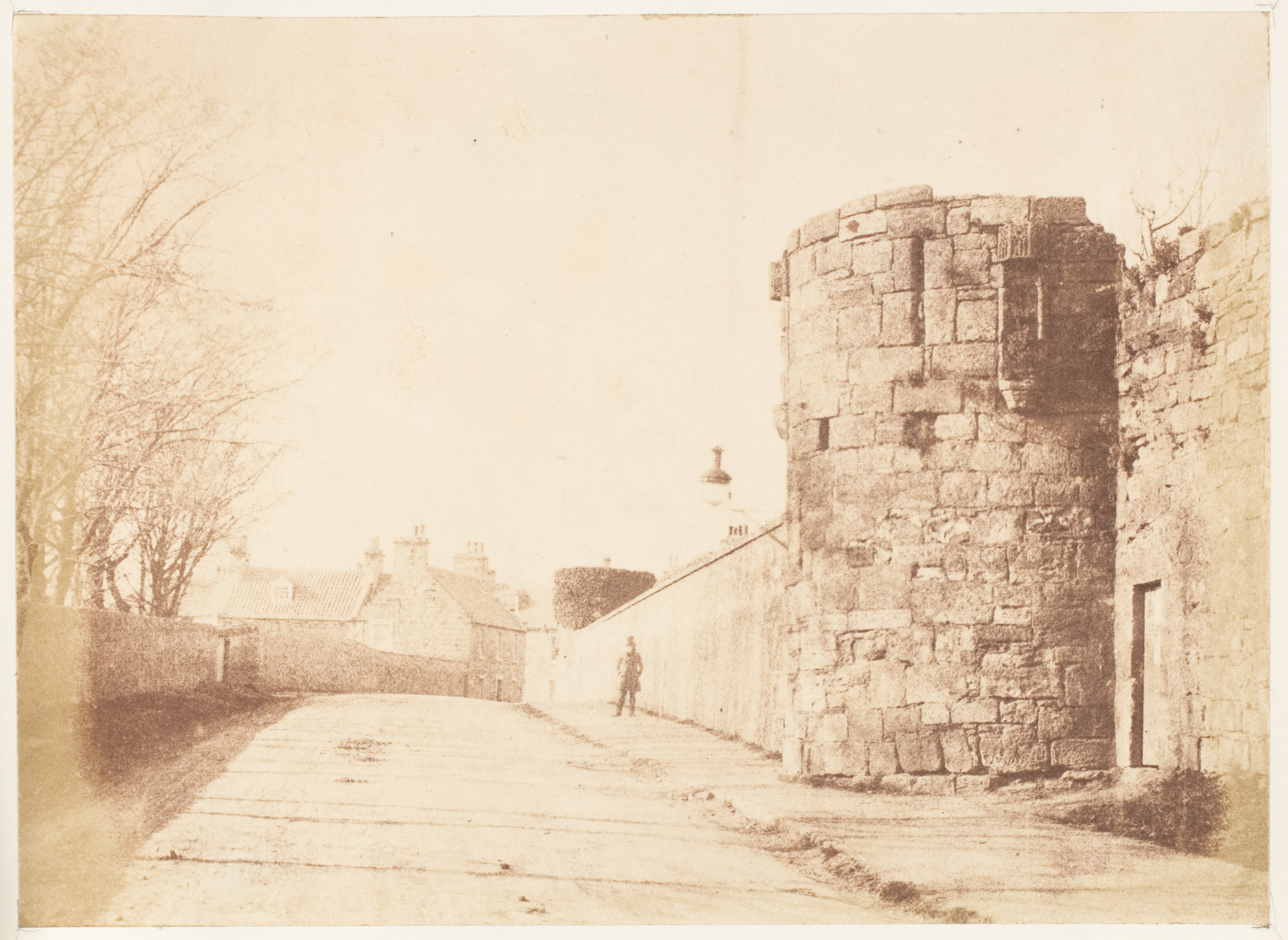 Ruined Stone Tower Beside Country Road
