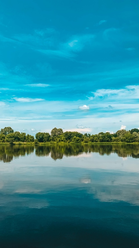 Calm River Reflections of Sky and Forest