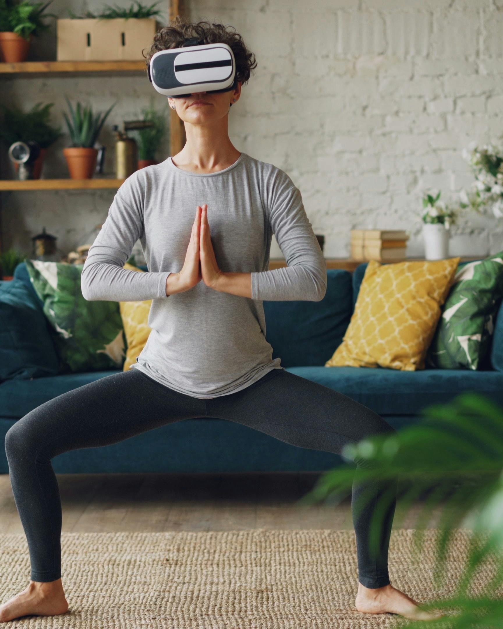 Woman Doing VR Yoga at Home